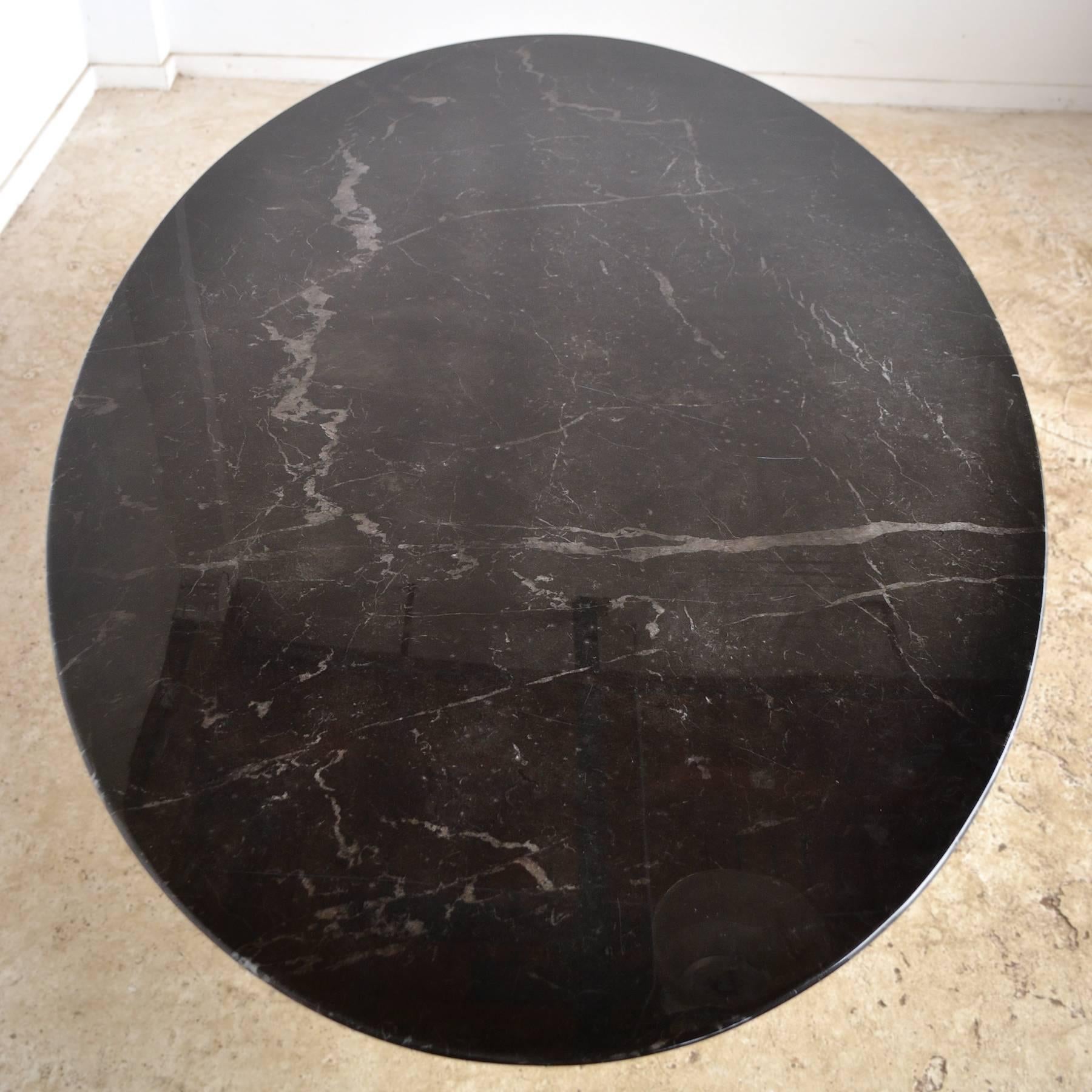 black marble tulip dining table