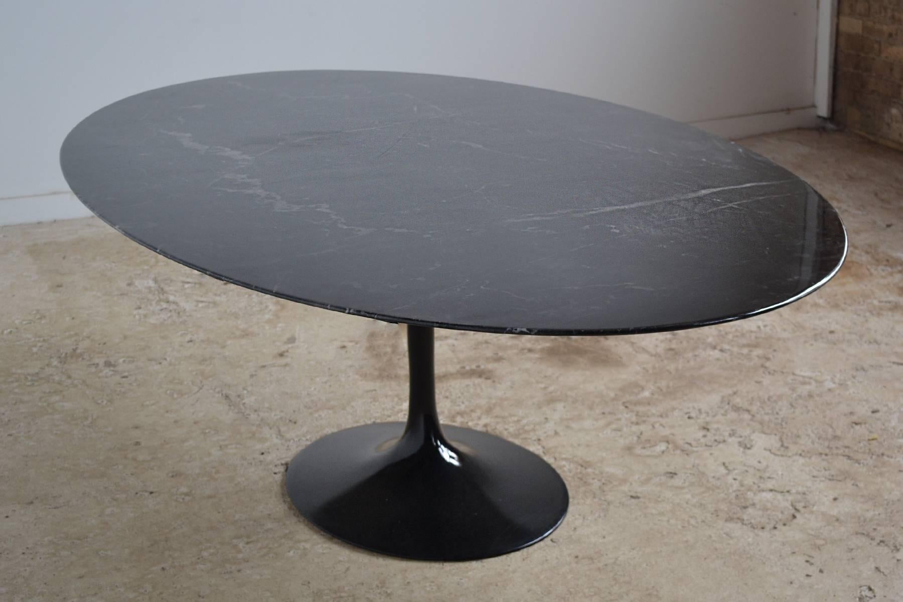 black marble saarinen table