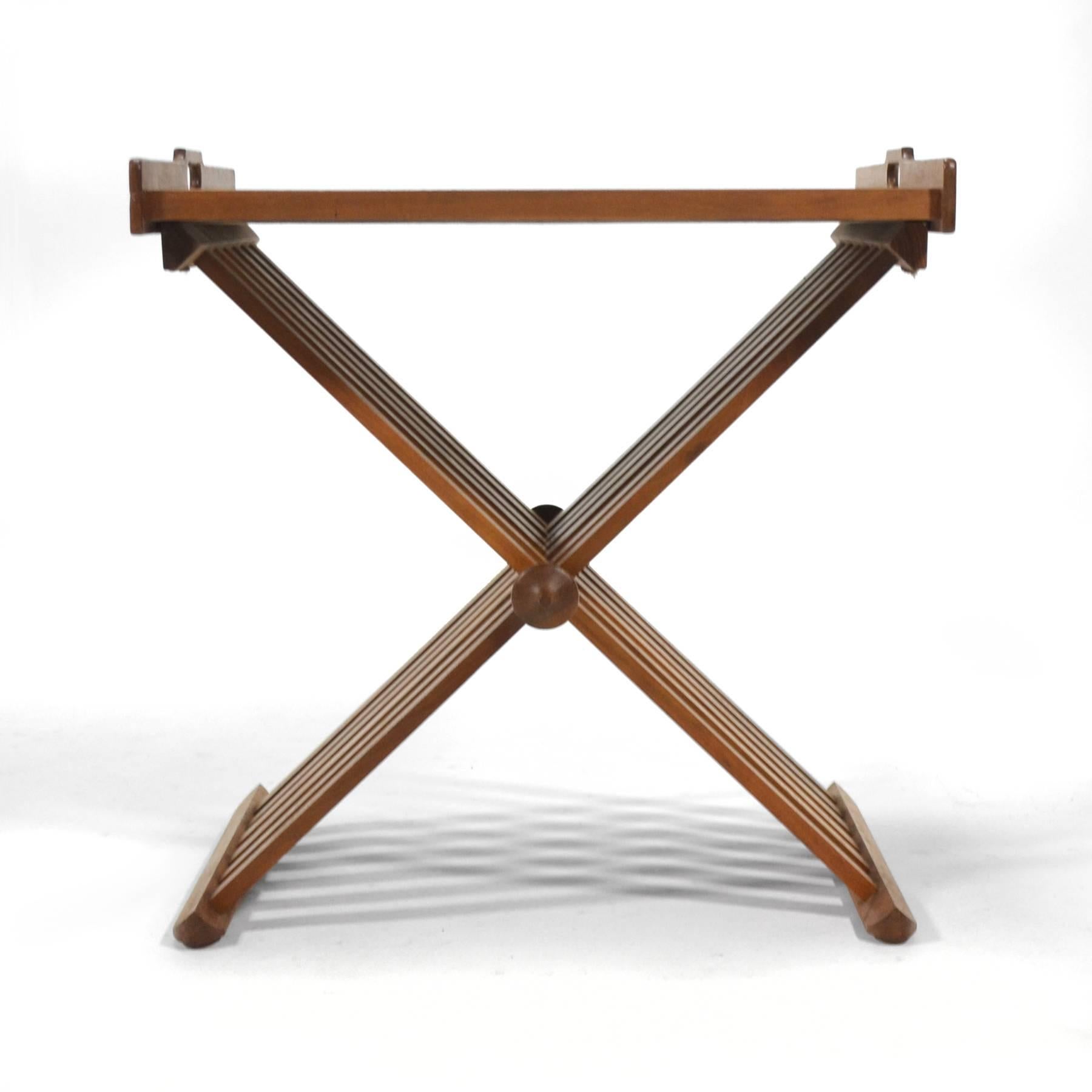 This wonderful, highly functional table by Stewart/ McDougall was part of their 