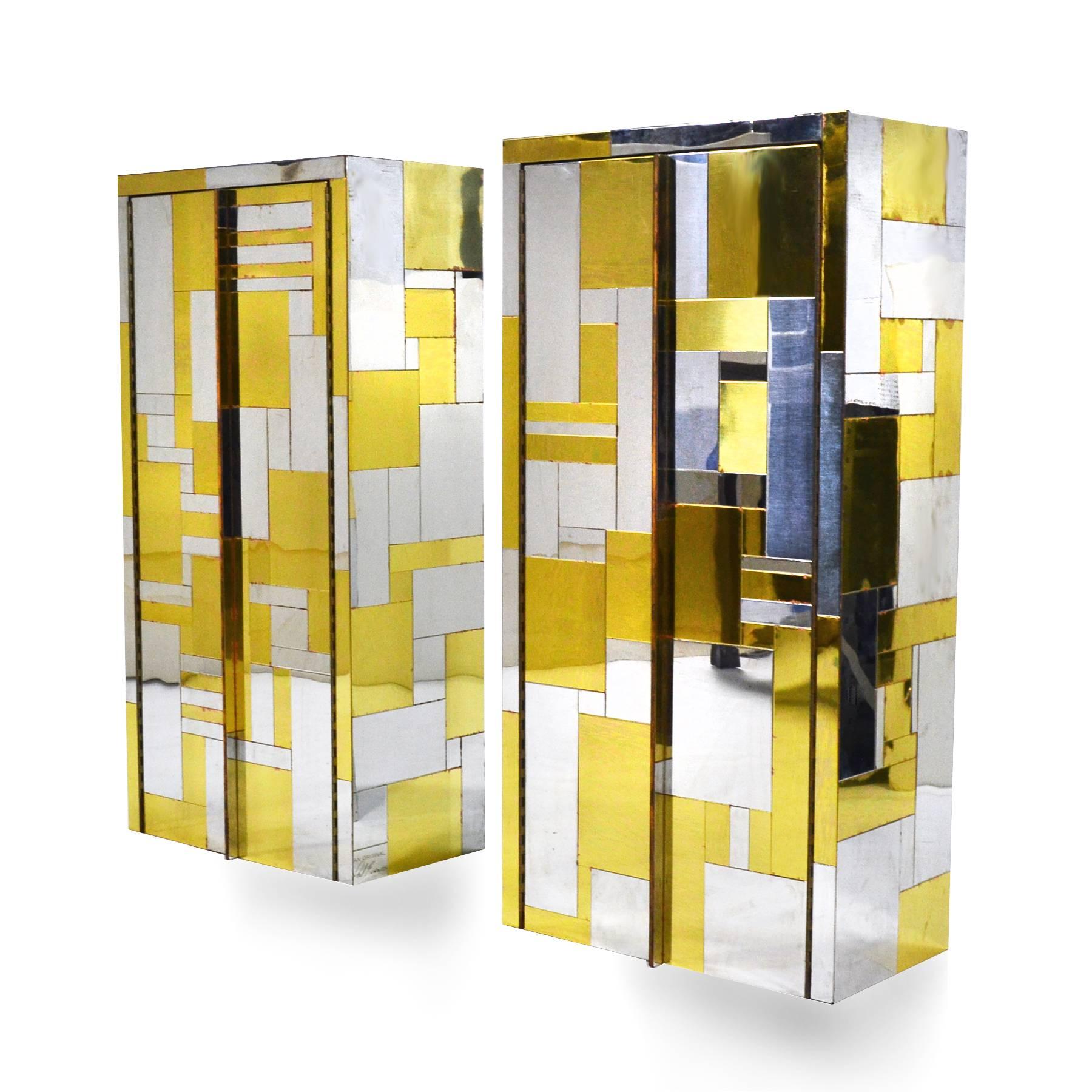 This pair of uncommon wall-mounted Paul Evans cabinets are from the designer's PE 200 Cityscape series. They are covered inside and out in a rich patchwork of brass and chrome. 

Please see our other listings for the matching dining table. The