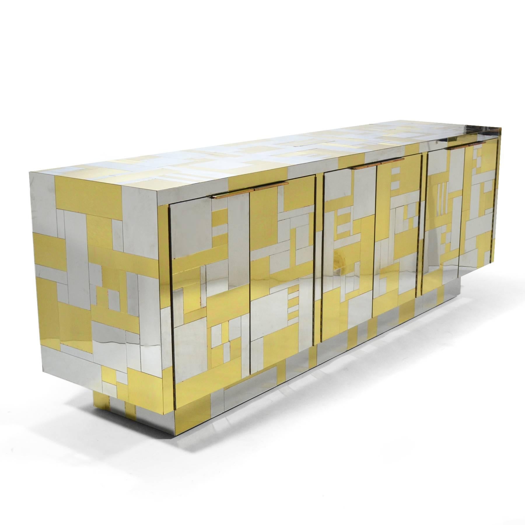 This stunning credenza is from Evans' PE200 Cityscape series and has the most pleasing composition of brass and chrome patchwork.

 