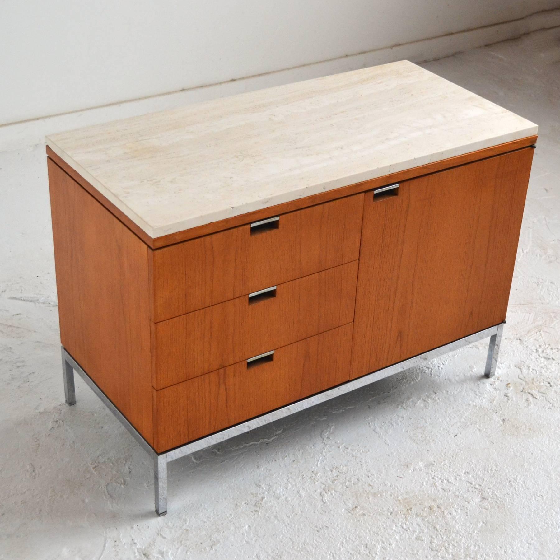 Florence Knoll's understated design sensibility is evident in these teak two position credenzas. They have several very nice subtle details like the recessed drawer pulls, the reveal between the base and body, the adjustable square feet which match