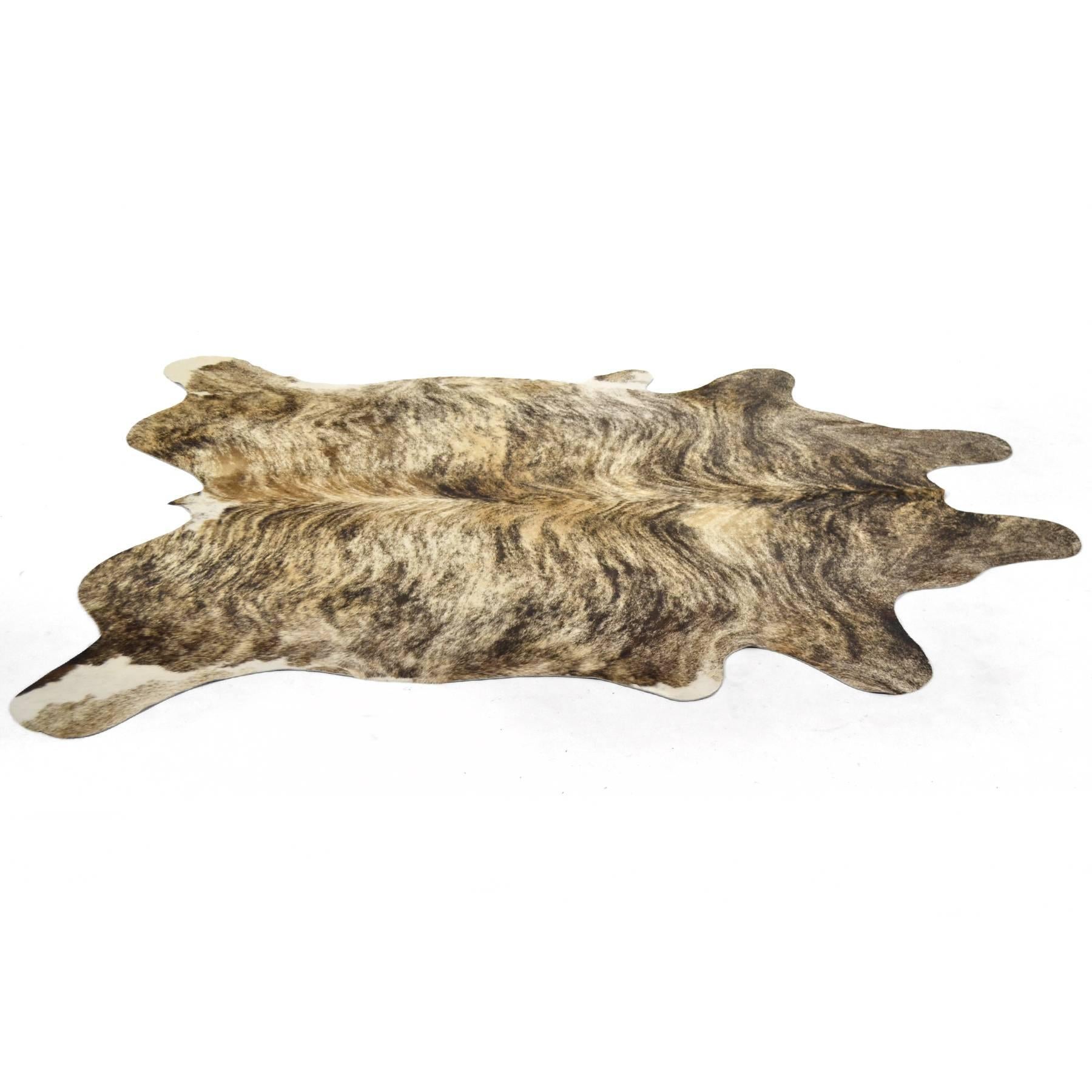 This cow hide rug is not only beautiful with it's brindle color and markings, it is in great condition.