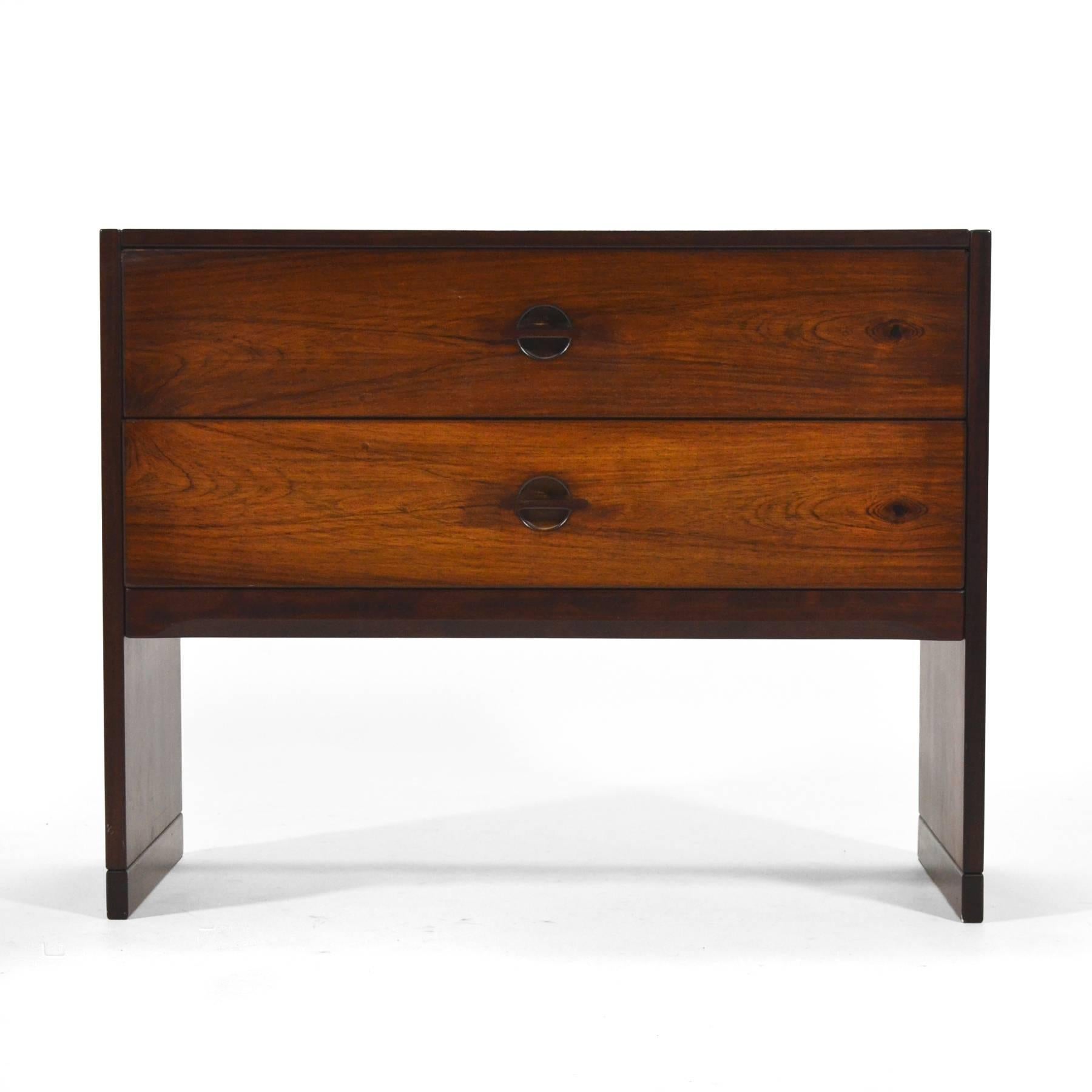 A beautiful Aksel Kjersgaard chest crafted by Odder Mobler of rich rosewood with fine detailing.