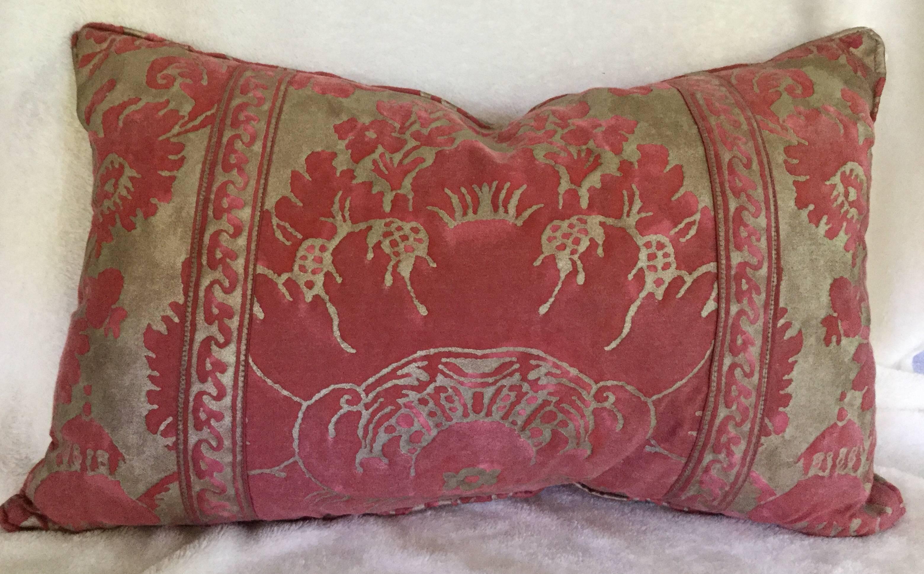 Decorative down-filled red and silver-
gilt Fortuny cushions with Fortuny trim.