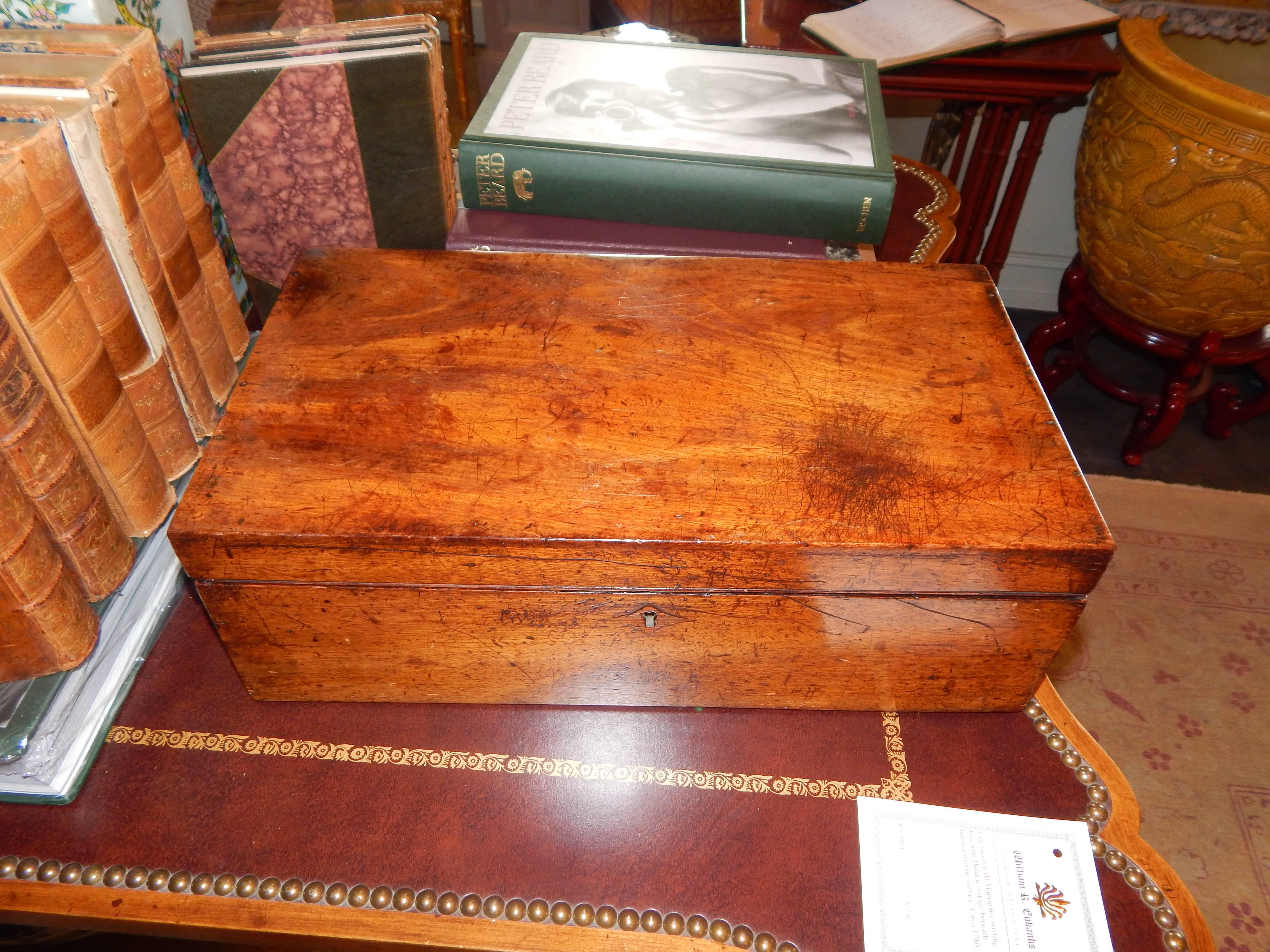 Handsome mahogany writing box with leather slope and hidden storage with key, English, circa 1780.
