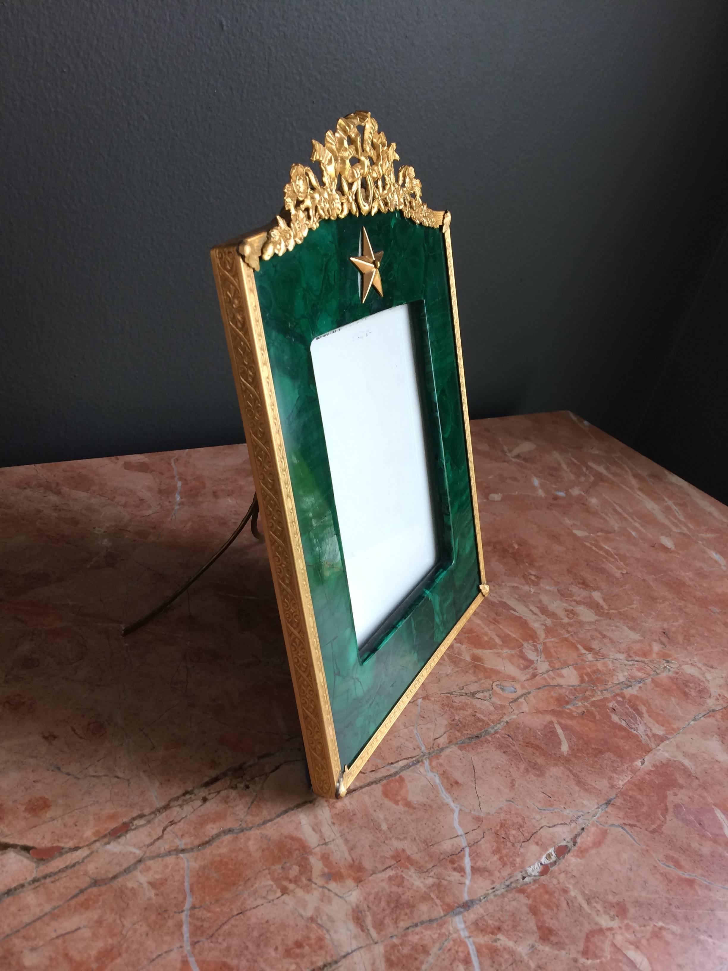 Empire style frame, bronze doré and malachite with rectangle opening.
 Measures: H 7 1/2" x W. 6 1/2".

