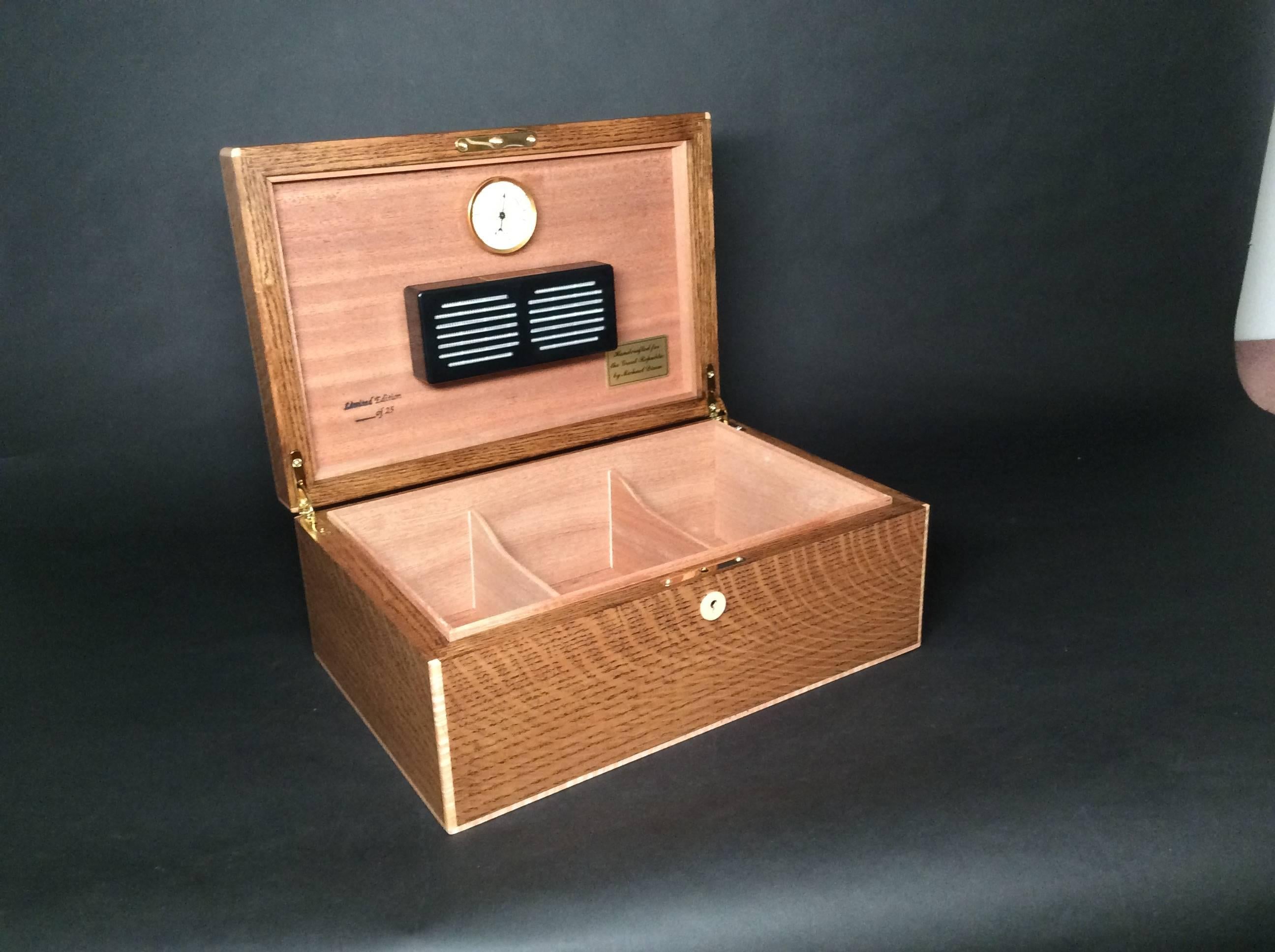 A handsome handcrafted cigar humidor, made from “rift sawn” white oak. This humidor is an exclusive product to The Great Republic, created in a limited edition of only 25. The lid of this distinctive humidor is hand-stamped with a seal of George