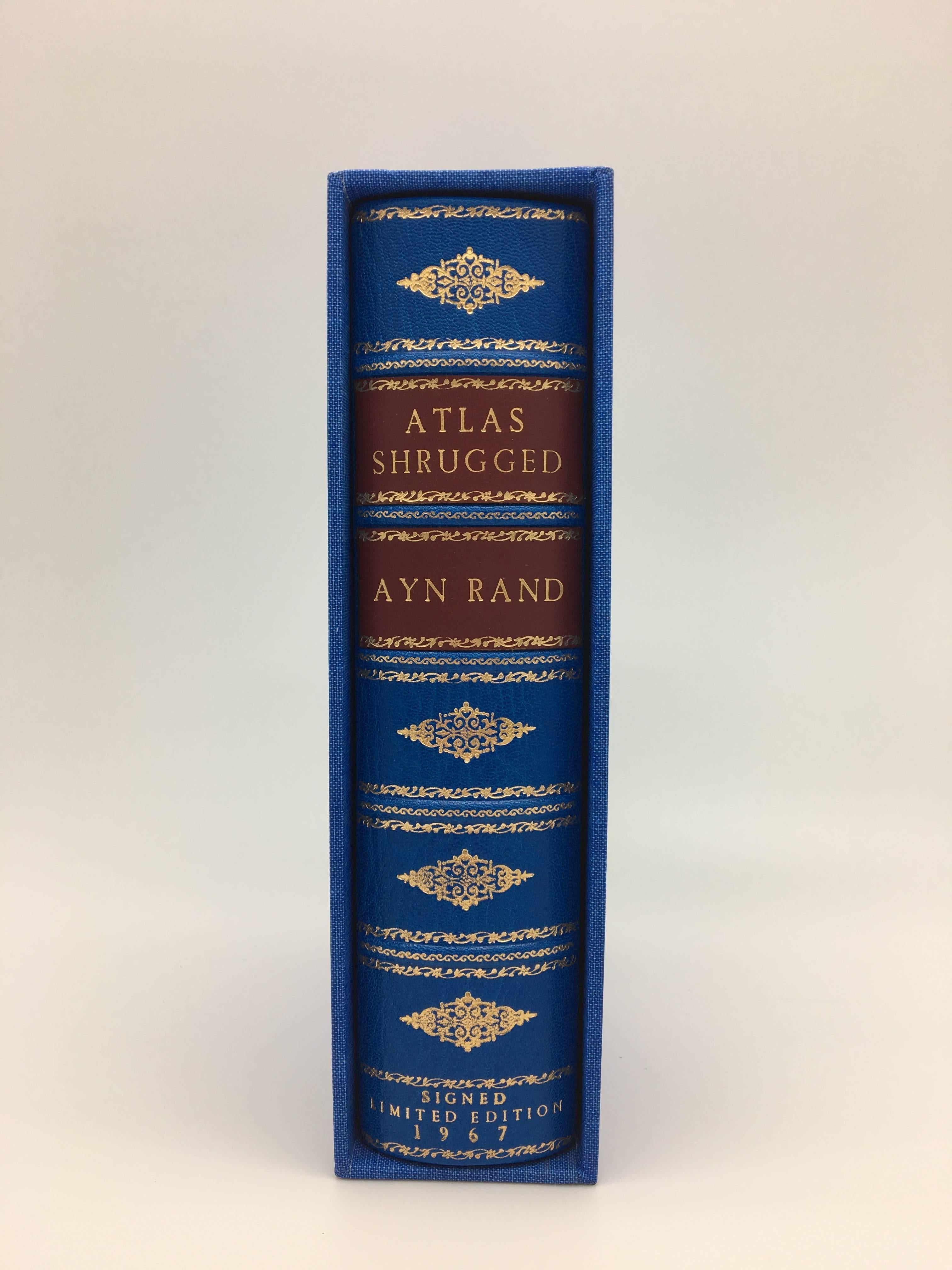 Rand, Ayn. Atlas Shrugged. New York: Random House, (1967). Octavo, bound in full leather with decorative gilt spine and marble endpapers -- signed by Ayn Rand on the limitation page.  Housed in a custom blue cloth slipcase with an image of the dust