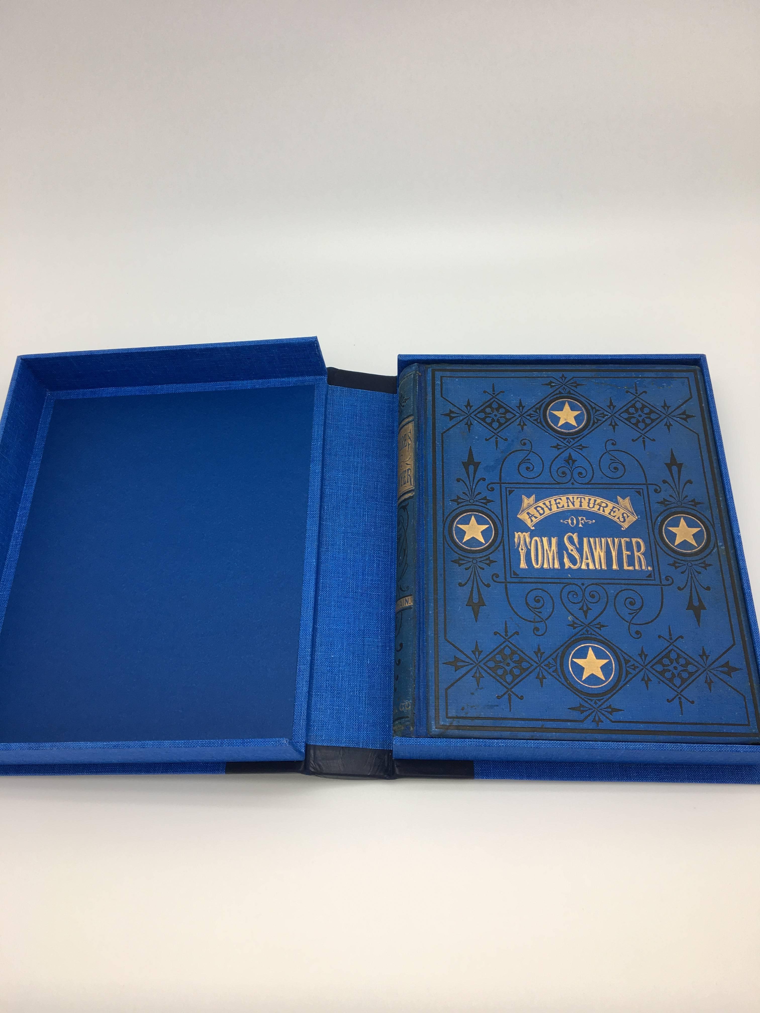 Twain, Mark. The Adventures of Tom Sawyer. Hartford, Connecticut: The American Publishing Company, 1876. First US edition, Second printing. Octavo, original gilt and black-stamped blue pictorial cloth. With by 144 illustrations.

This is the rare,