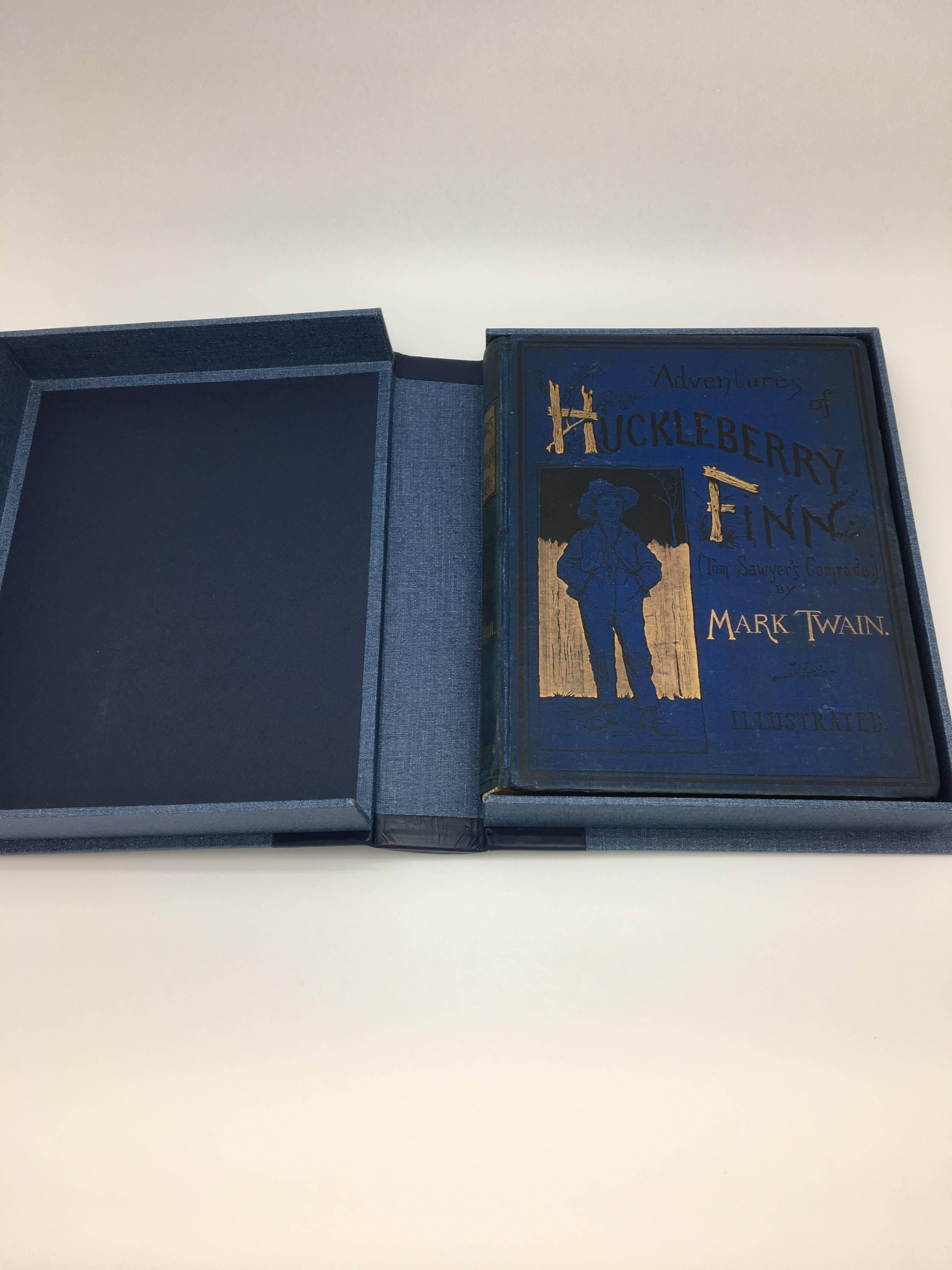 Twain, Mark. Adventures of Huckleberry Finn (Tom Sawyer’s Comrade). New York: Charles L. Webster, 1885. Octavo, original gilt and black stamped blue pictorial cloth. Housed in a custom handcrafted clam-shell box.

Rare first edition, first issue,