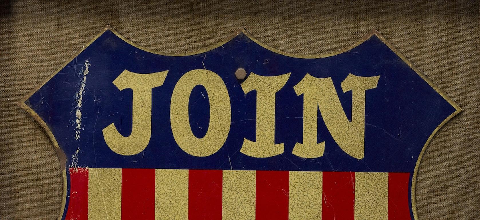 Offered is a rare WWII era U.S. Army recruitment sign, designed by the Transportation Corp. Rail Service. This painted sign would have been displayed on rail tracks to help recruitment efforts for WWII. The sign is shaped as a shield, with a blue