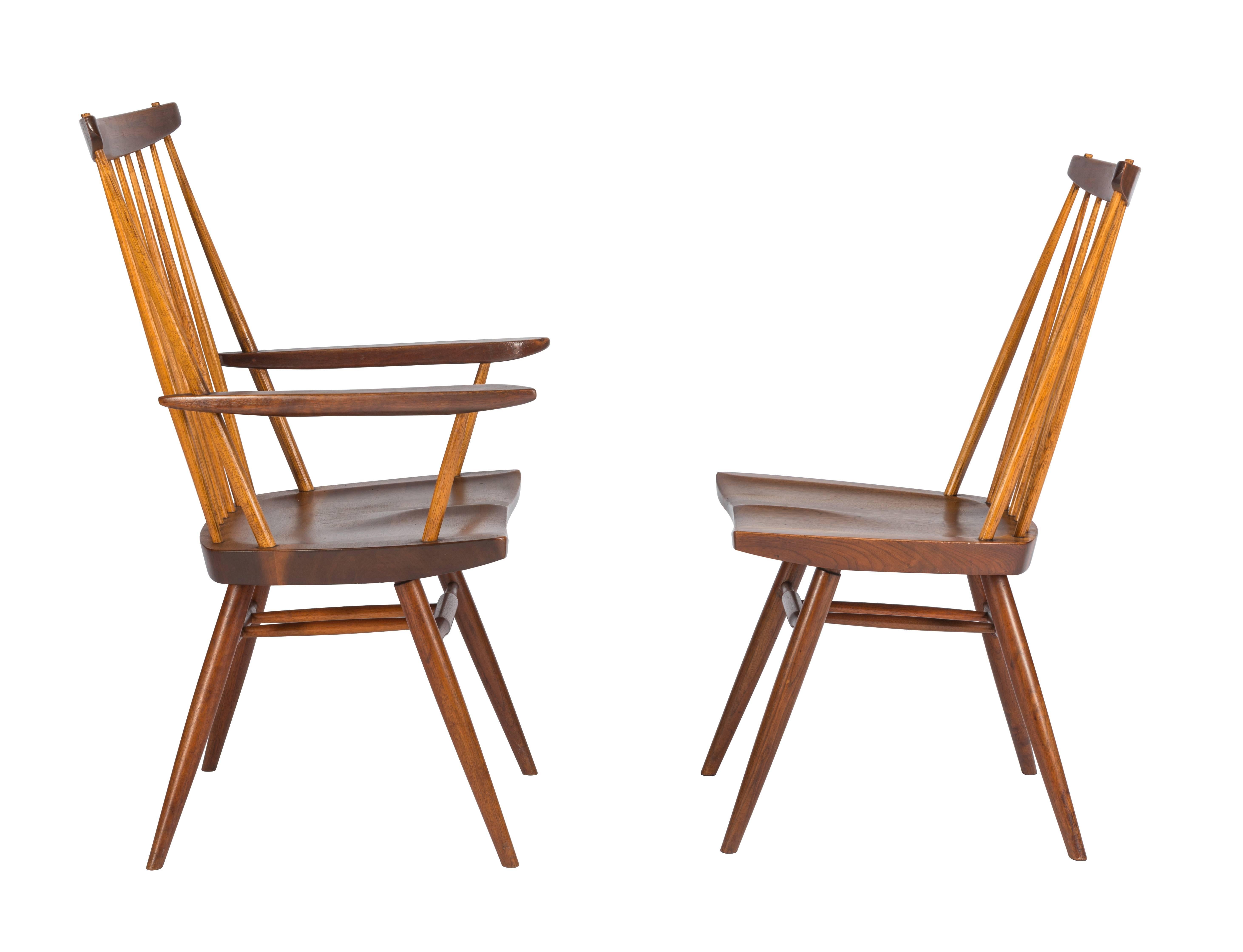 Nice set of Nakashima "New" chairs in walnut. One armchair and five side chairs. Set comes with complete provenance.