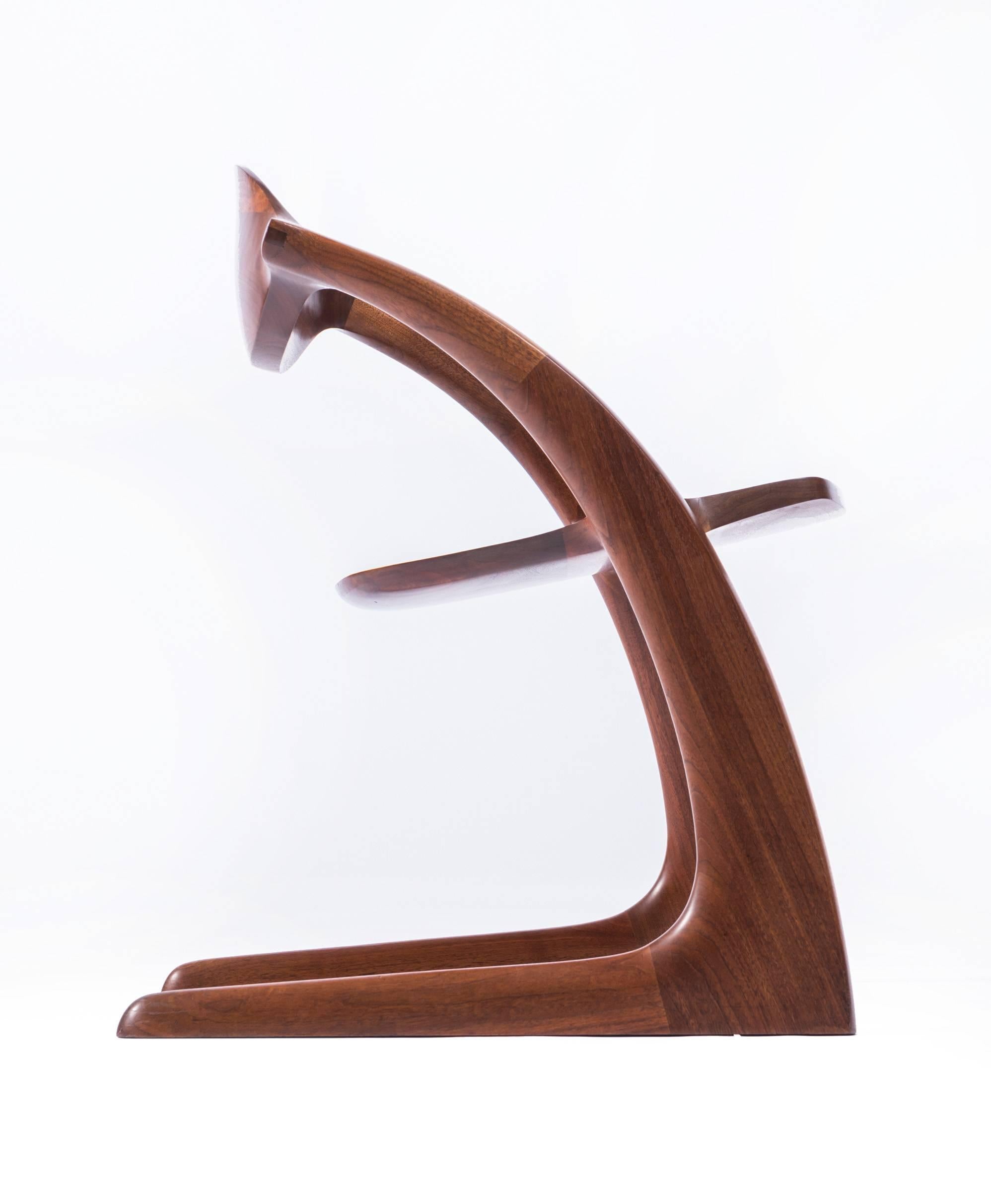 Extremely rare Wendell Castle all wood Zephyr chair. A finely detailed and crafted chair by one of America's most accomplished designers. Signed and dated W. Circa 1979. In excellent condition.
 
