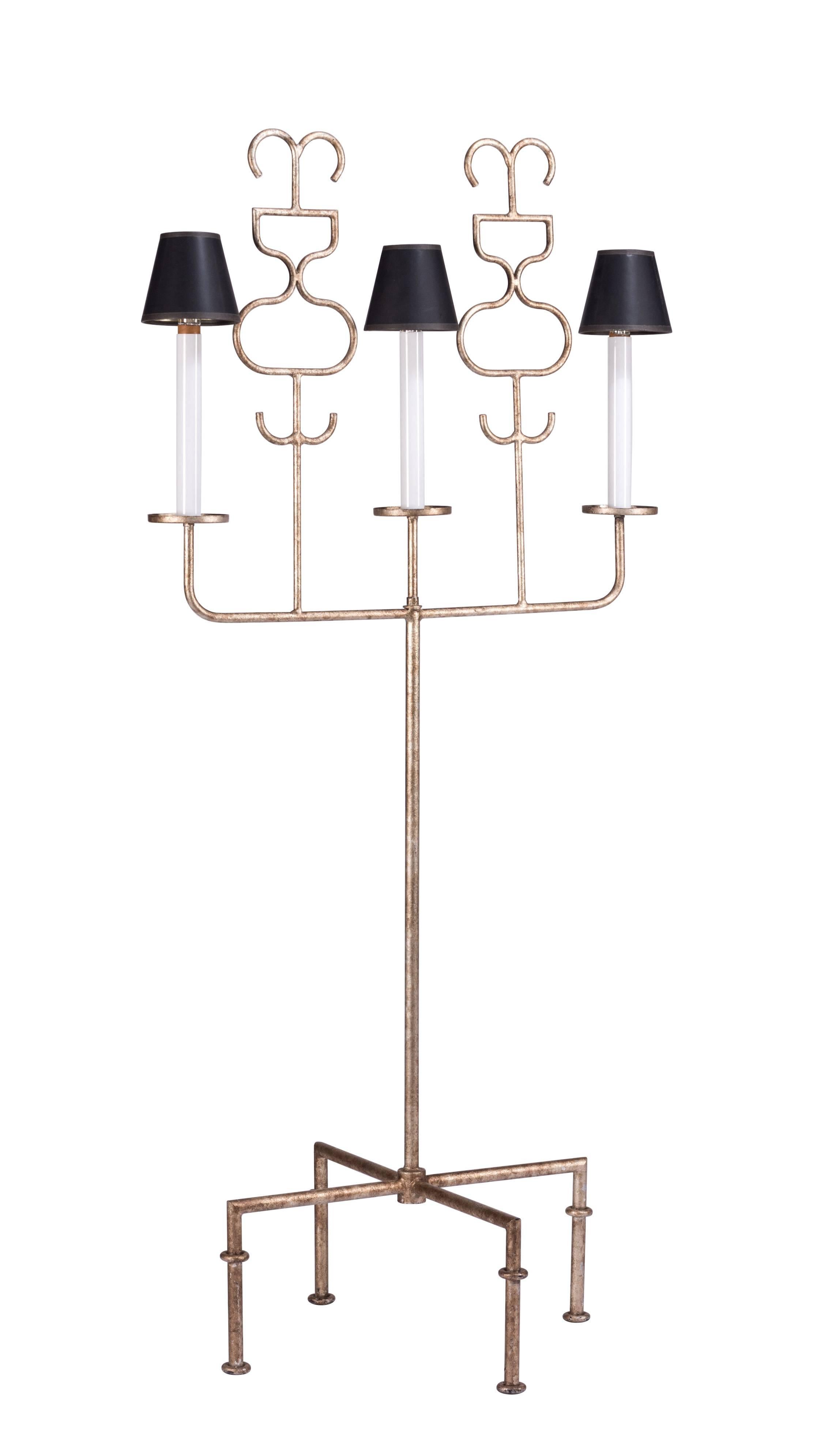 Whimsical enameled steel floor lamp by Parzinger for Parzinger Originals, circa 1960. The enameling on the steel standard gives the appearance the metal is covered in silver leaf. In good working order.