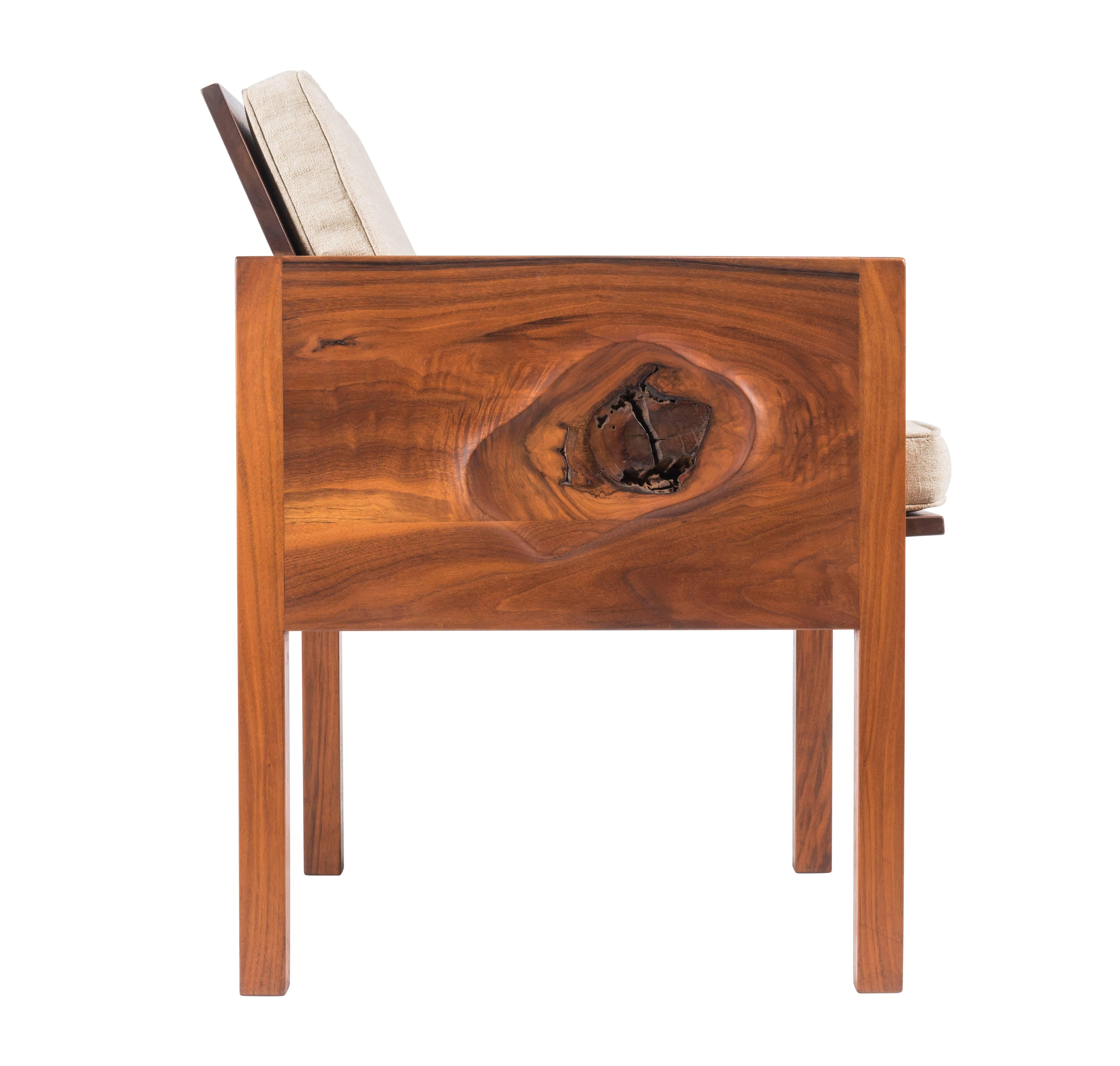 Hand-carved walnut occasional chair by Robert Whitley. This chair and the following listing are from a single owner named Florence Green, who commissioned Whitley to create a large collection of his work between 1965-1975 for her home in PA. Chair
