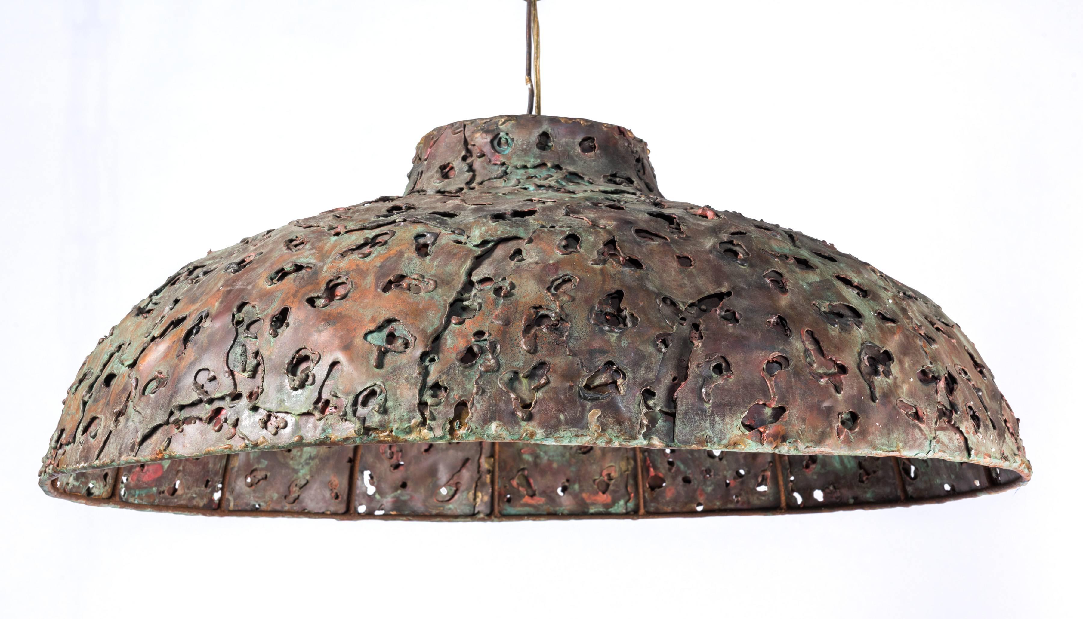 Custom and unique enameled steel and patinated copper Brutalist chandelier by American Studio Craft designer and artist Silas Seandel, New York, 1970s. With original mounting hardware and chain.
 