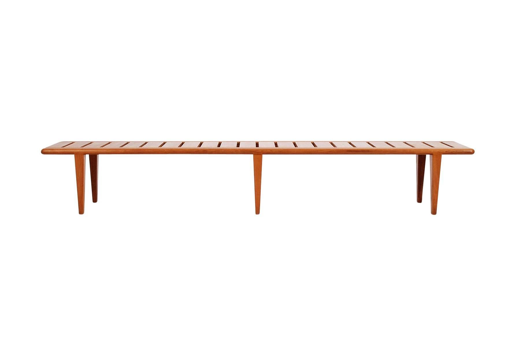 Bench in solid light teak by Hans J. Wegner, 1958. Measure: 6 ft.

Executed by Johannes Hansen, Copenhagen, Denmark, 1960s.