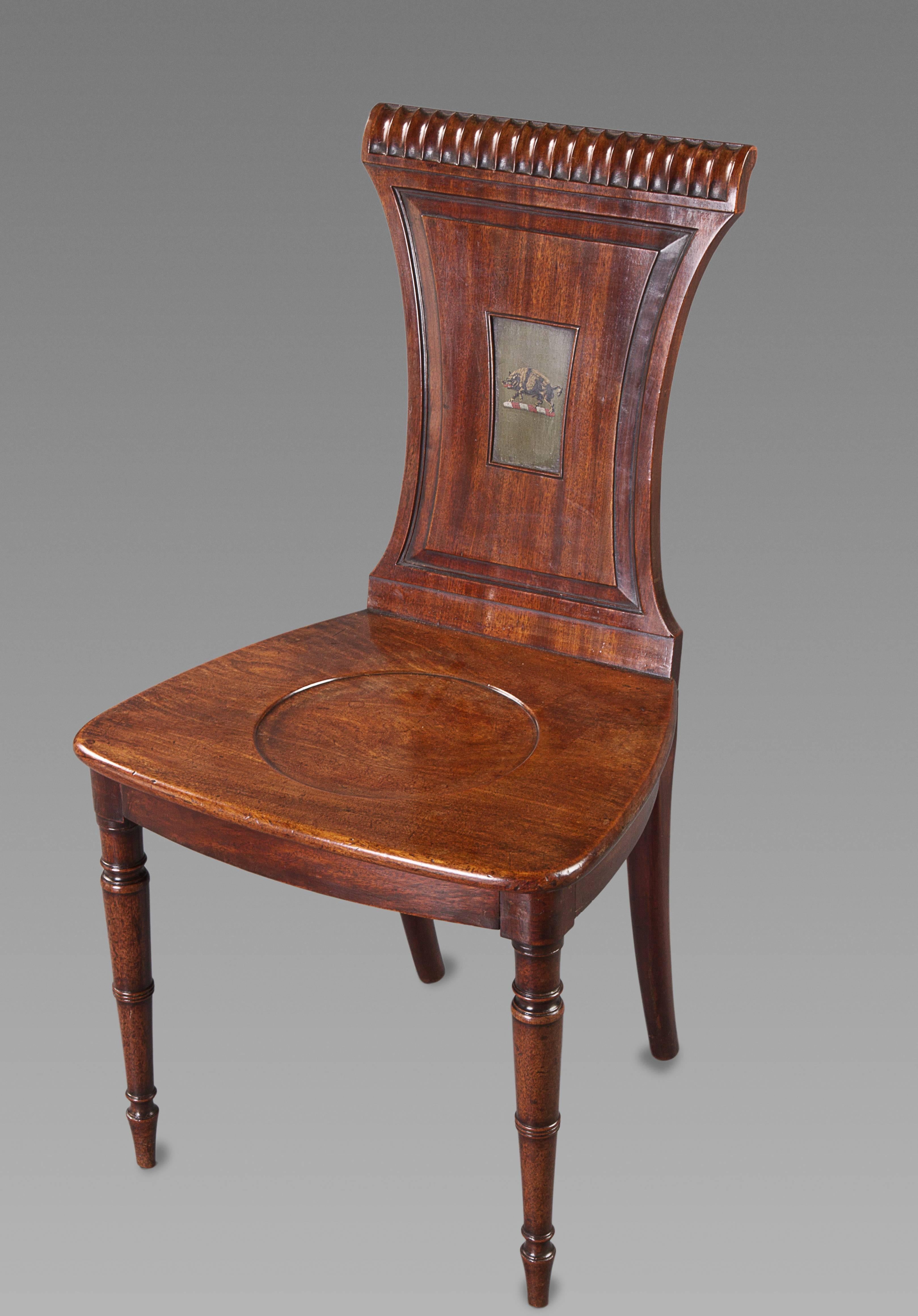 Fine Set of Four Regency Mahogany Armorial Hall Chairs In Excellent Condition For Sale In New York, NY