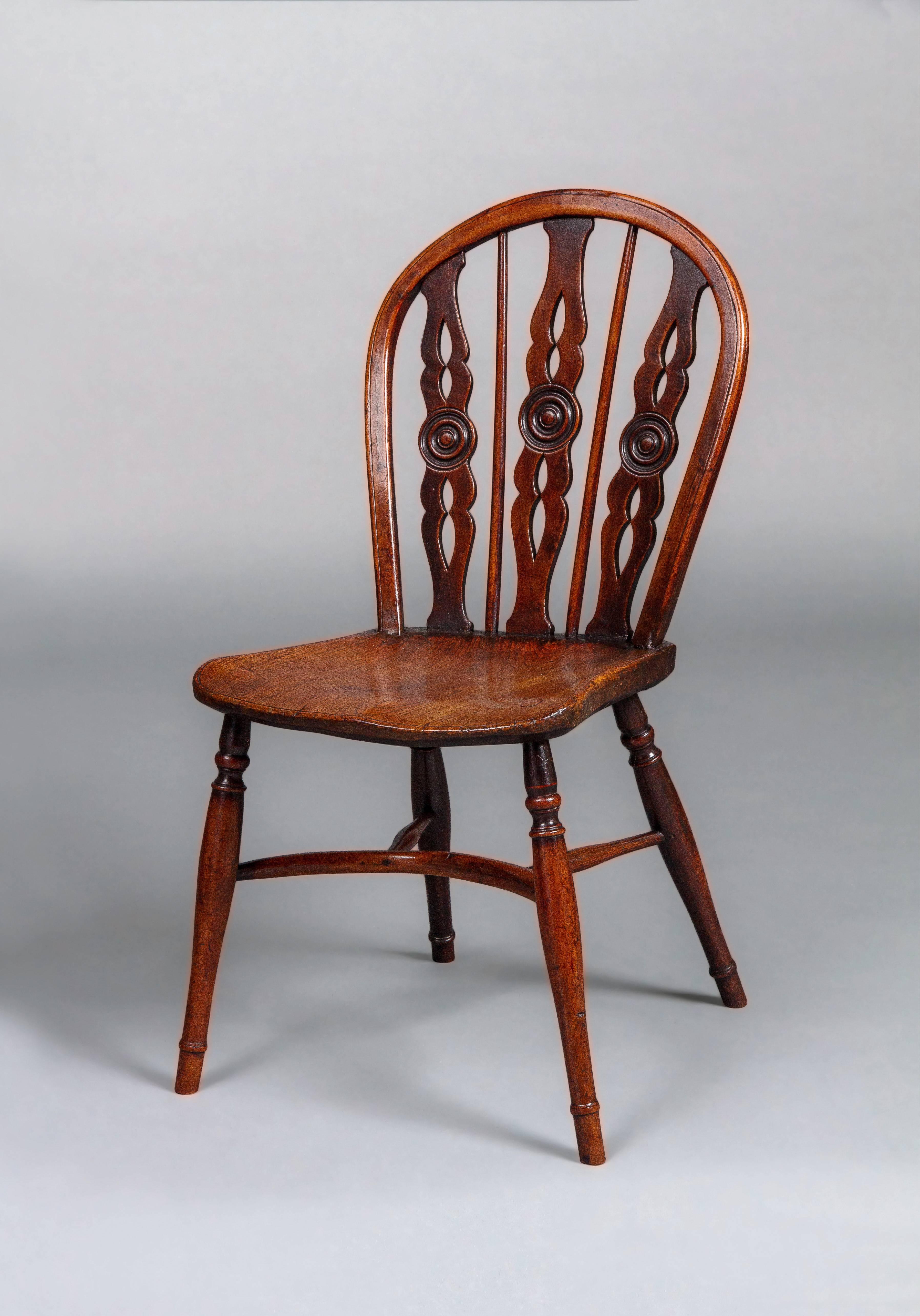 British Very Fine and Rare Set of Eight Yew and Elm Windsor Chairs