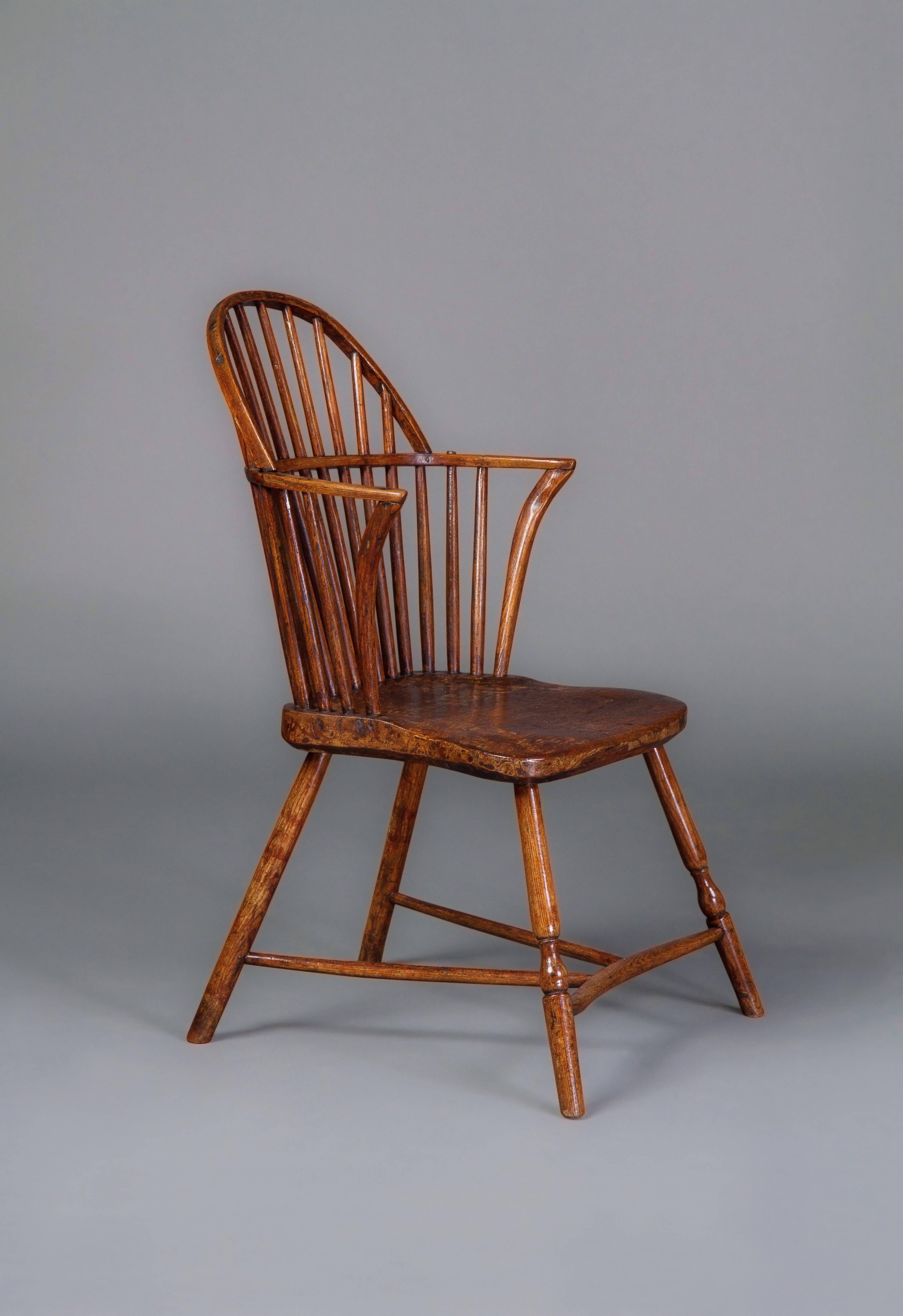 With a spindle back and shaped sycamore saddle seat on front out swept ring turned legs, joined by a crinoline curved stretcher with extra-long joining rods to the rear legs.
The famous firm of Gillows of Lancaster and London produced Windsor