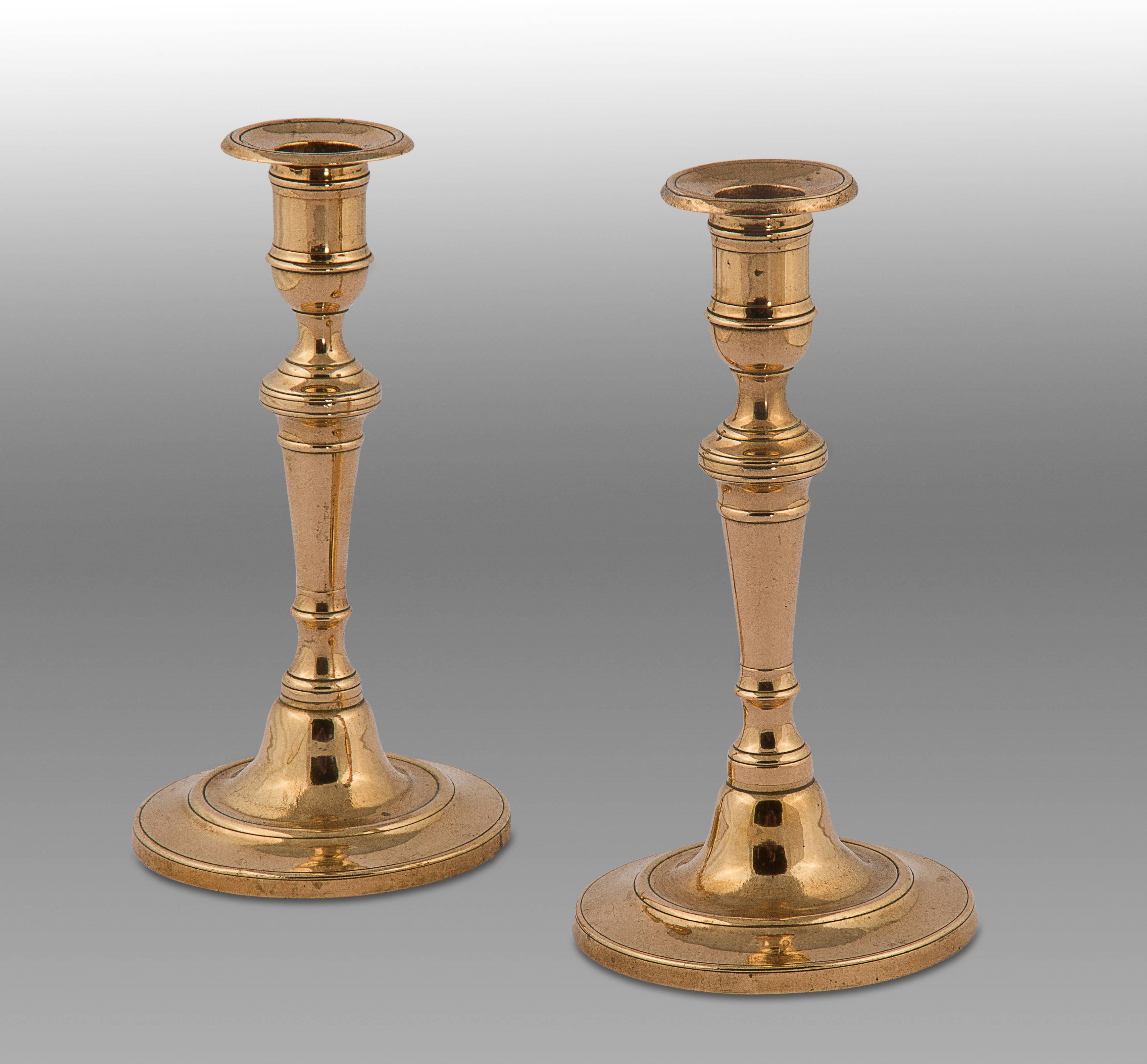 Of typical form except that the parts to the sticks unscrew so that they may travel without fear of being crushed. Unusually these sticks are made of copper bronze rather than the usual brass.
English, circa 1790.