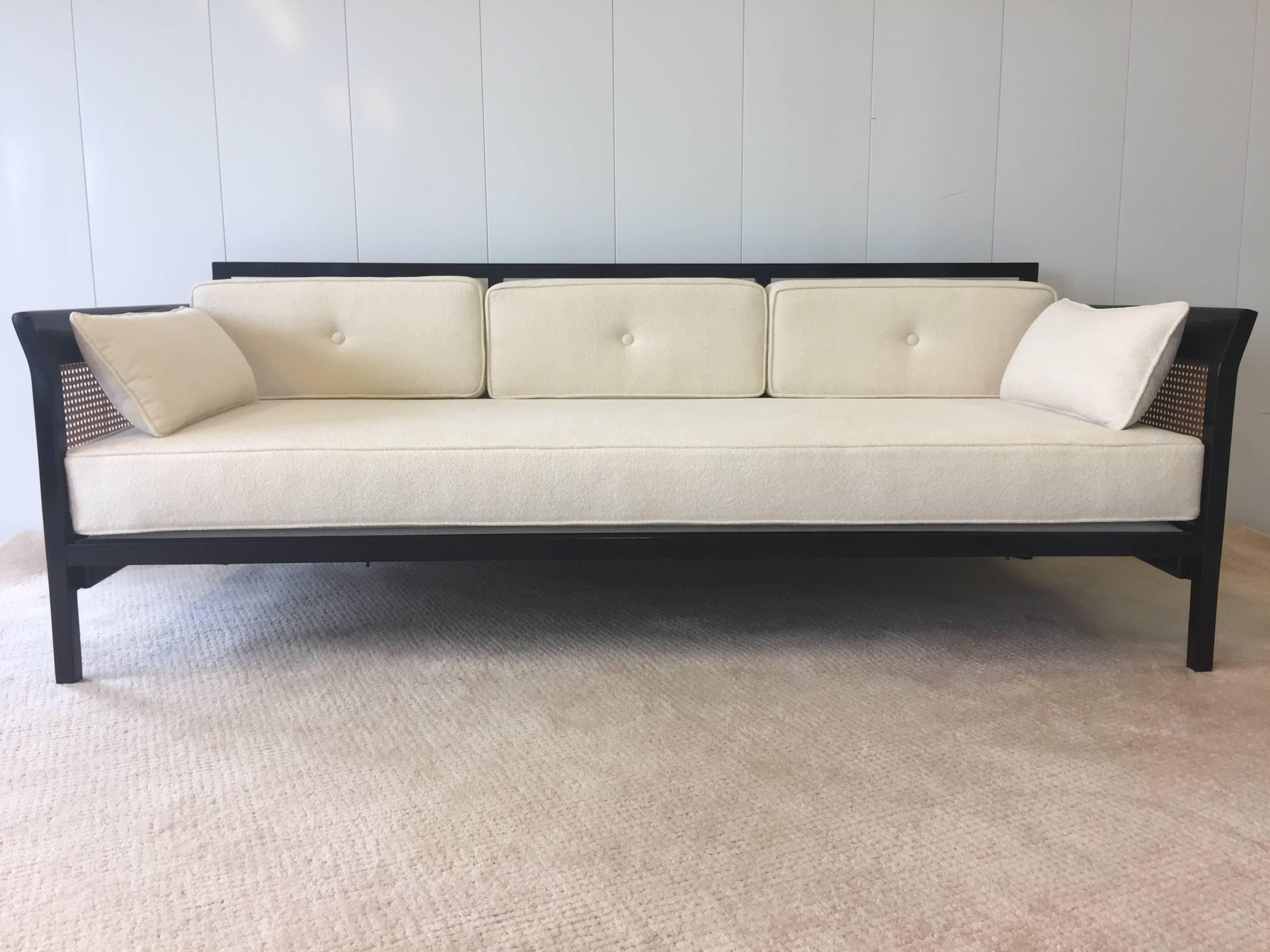 Edward Wormley sofa/daybed elegant dark walnut cane side, chenille fabric,exceptional quality and workmanship , heavy constructed steel frame base. Depth to back cushion is 26