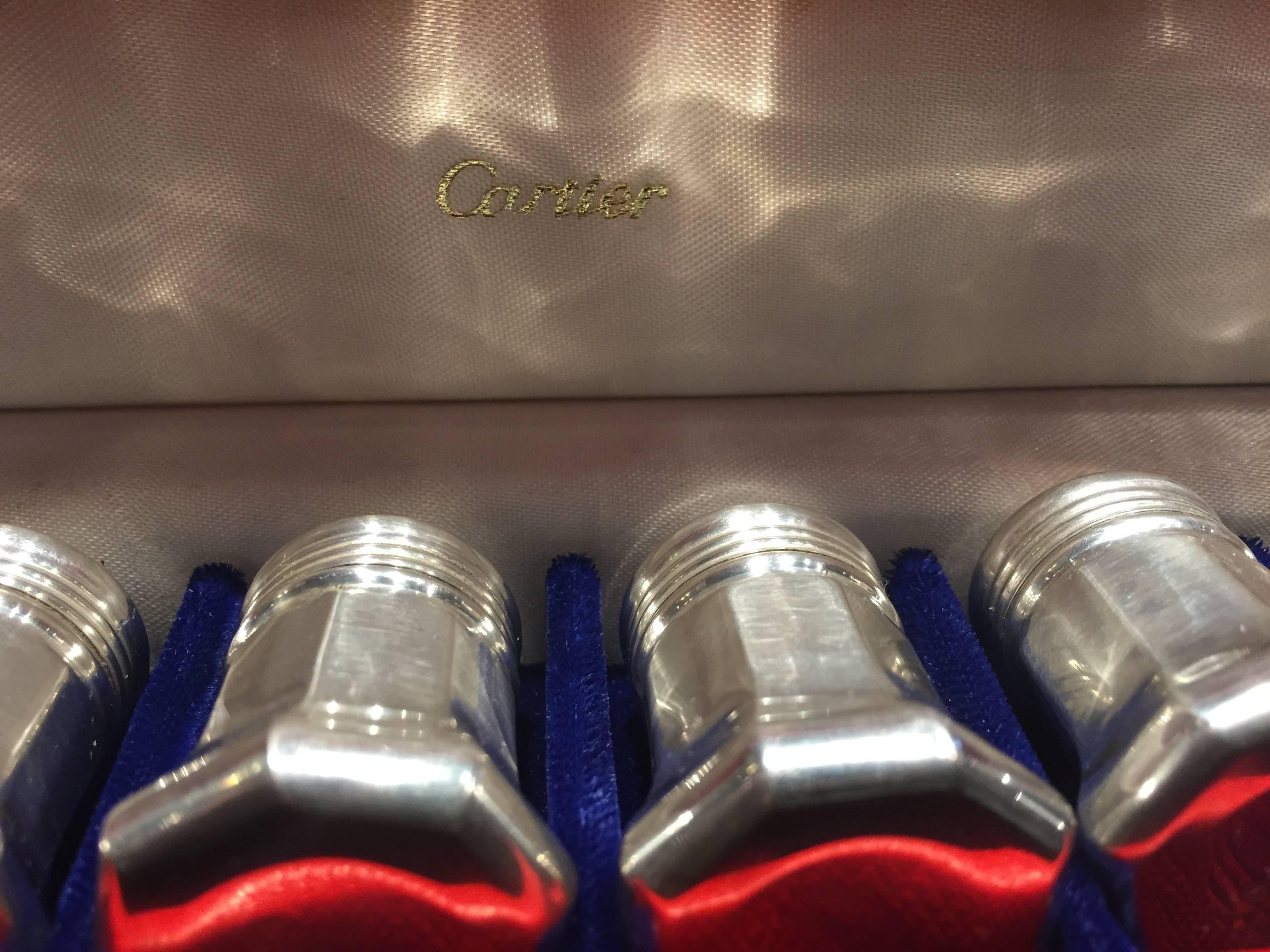 Cartier sterling miniature set eight, four pairs salt and peppers in original Cartier Box and outer packaging size of packaging 9.50 x 2 x 2.