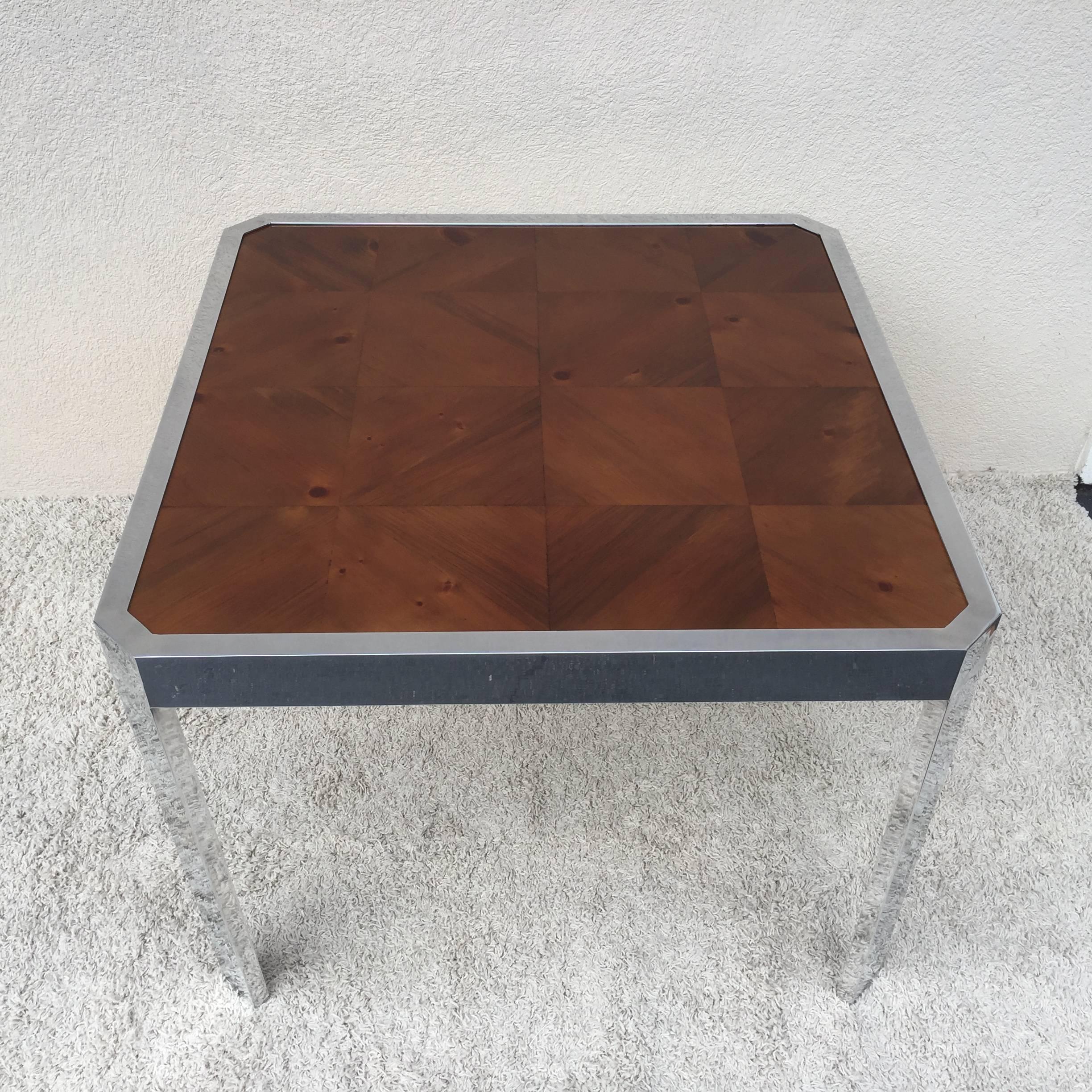 Paul Evans style cityscape polished aluminum parquet top card table small.
Dining table.