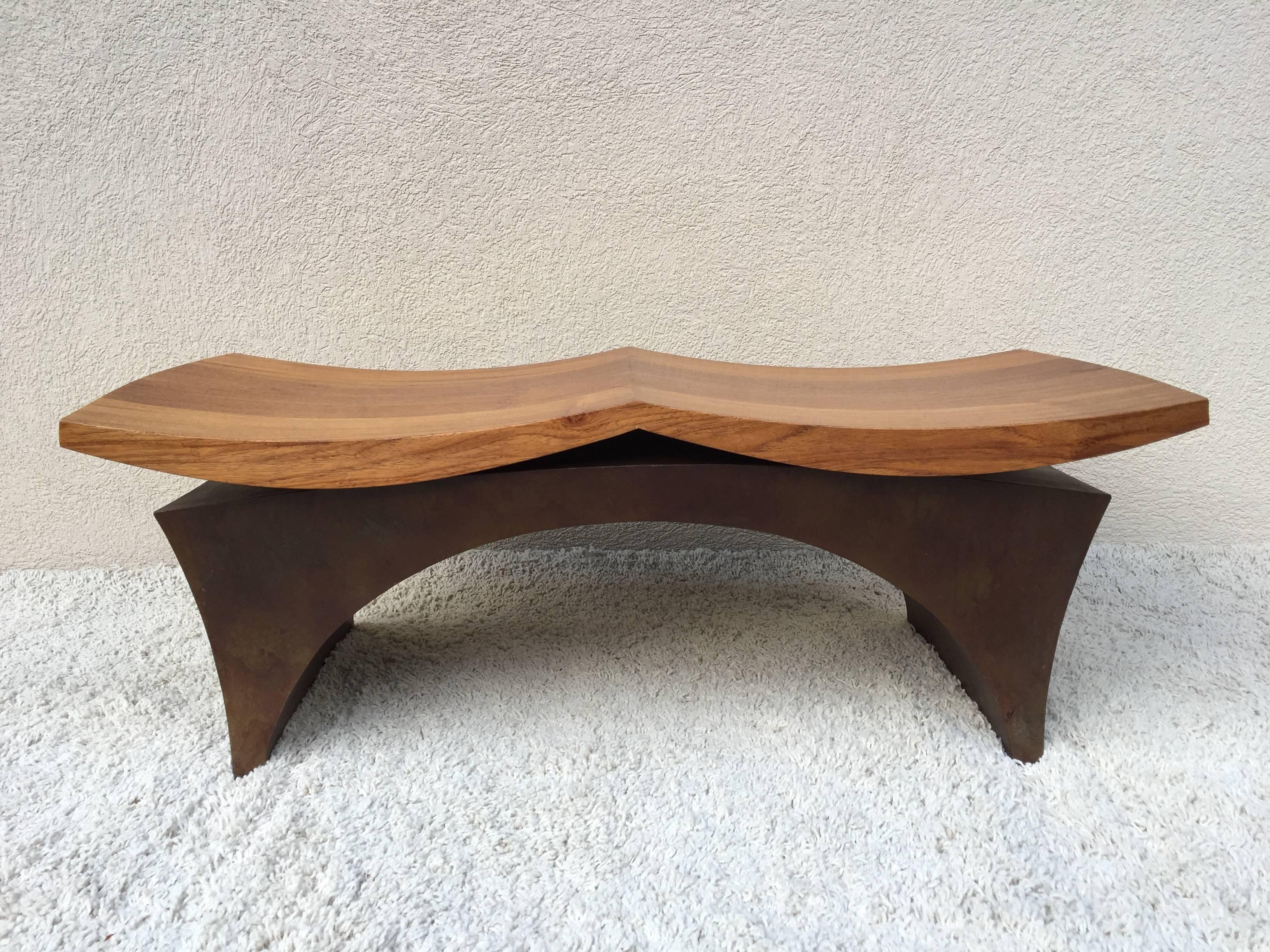 Chris Martin signed winged bench, handmade Narra wood top with bronze patina steel base.One of three ever made.