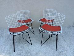 Set of Harry Bertoia Childs Chairs, Original Knoll Orange Seat Pads
