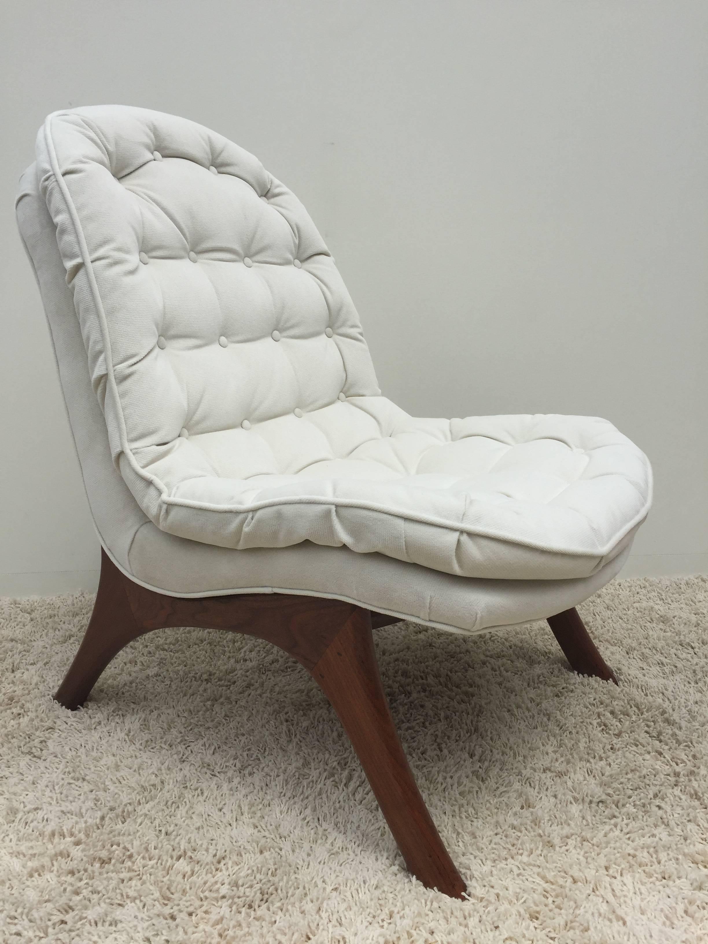 Pair of tufted off-white armless club chairs and slipper chairs with curved back and legs in the style of Adrian Pearsall.