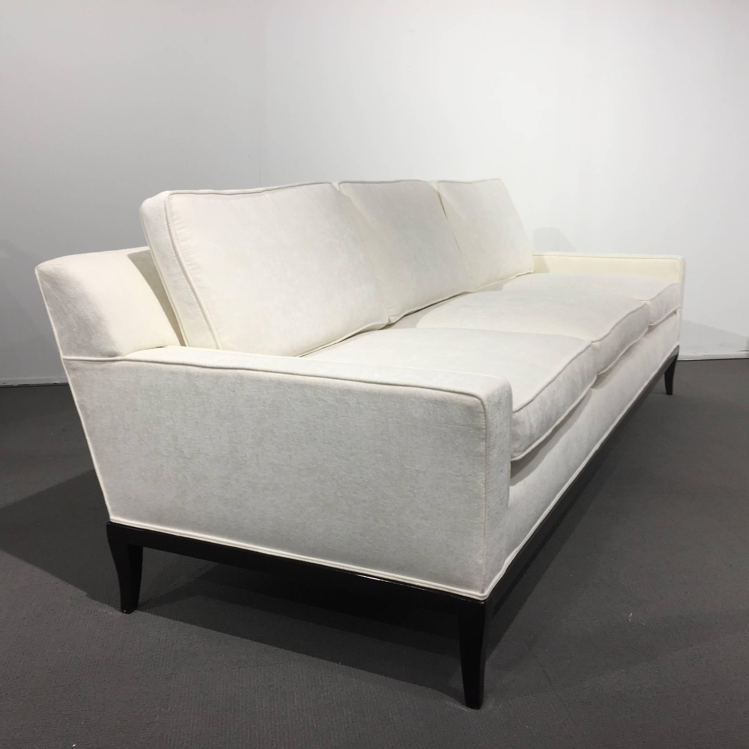 Tommi Parzinger, Parzinger original custom sofa , from Parzingers accountant , in off-white chenille and dark walnut legs.