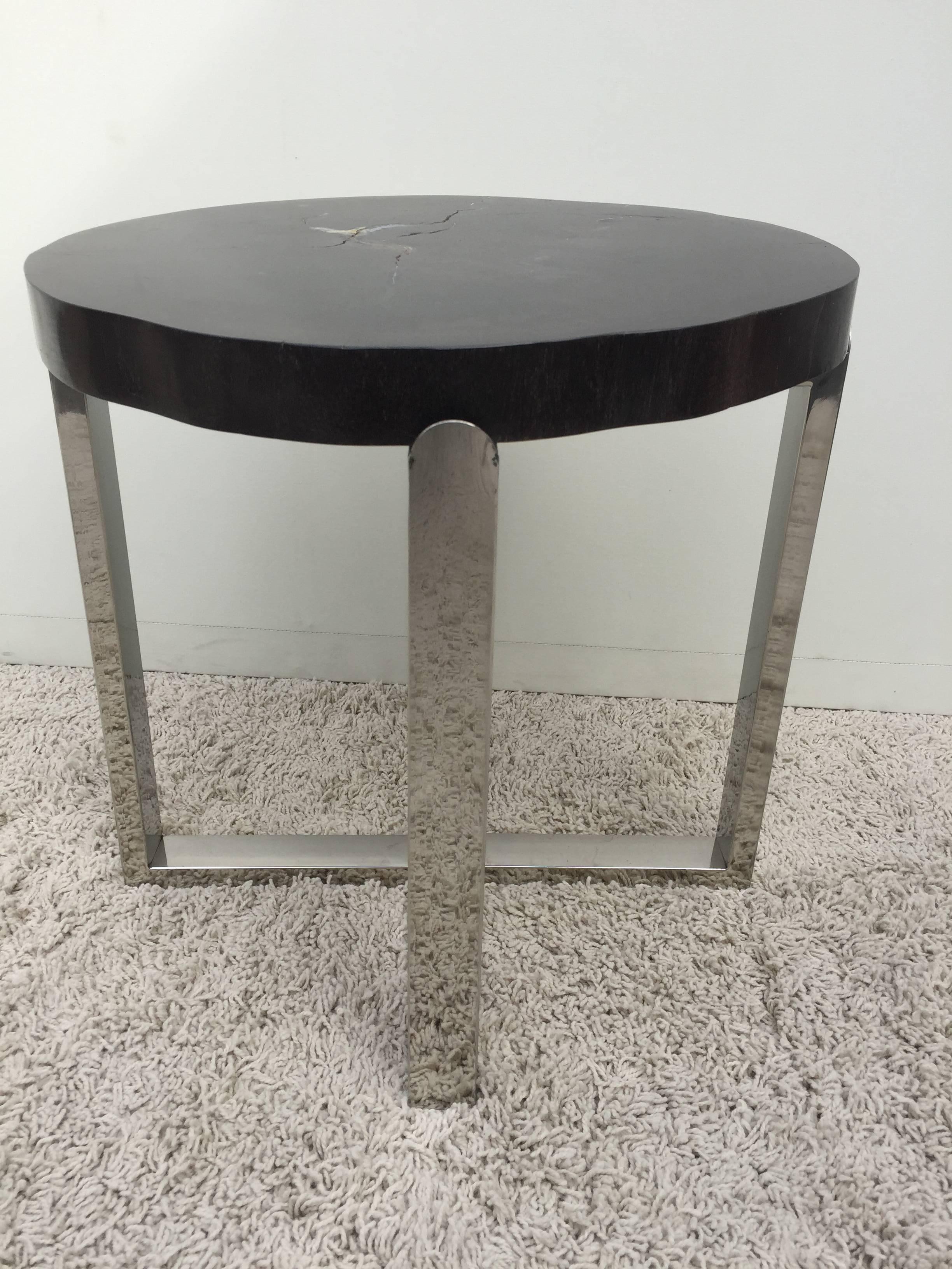 Pair of petrified wood black and crème vein, polished handmade chrome base, petite side tables. Unique one of a kind. With criss-cross continuous base.