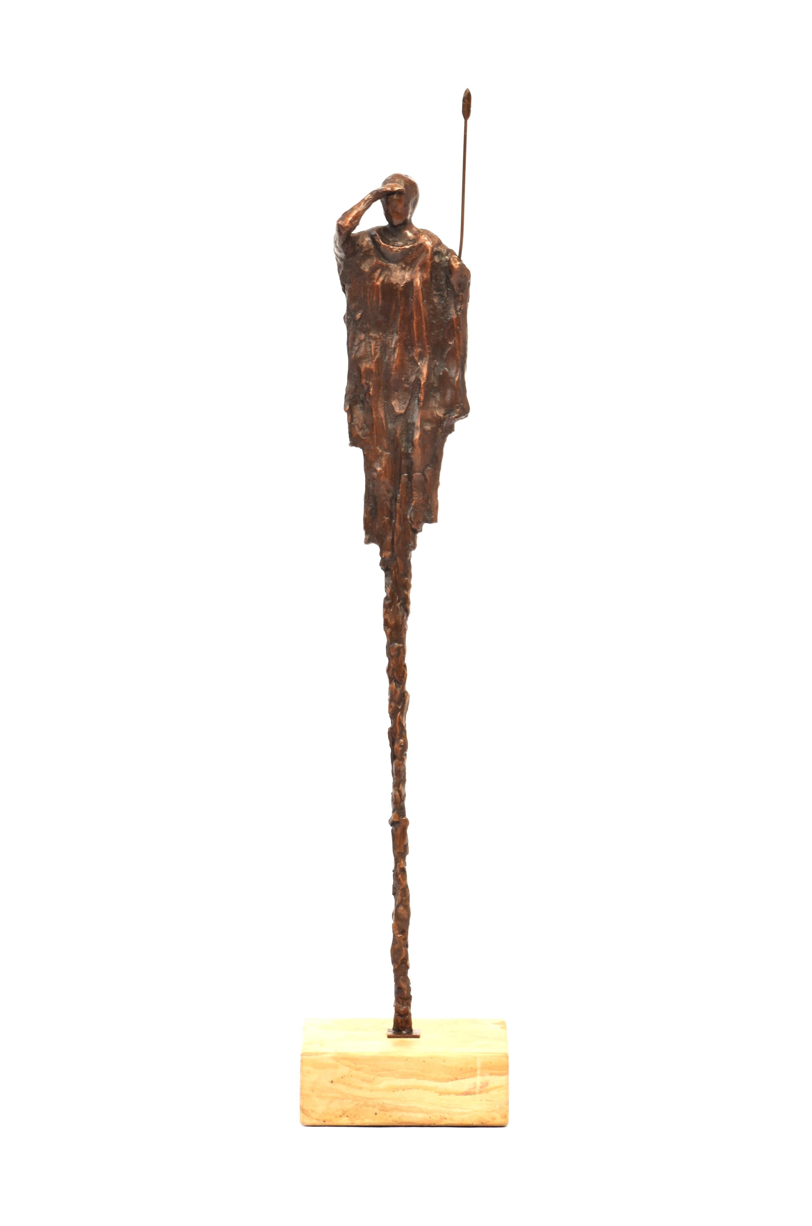 This bronze sculpture captures a Maasai warrior in a moment of stillness and anticipation — poised at the very start of the hunt. I was inspired by the elegant silhouettes of tribal figures shimmering through the African heat, their presence both