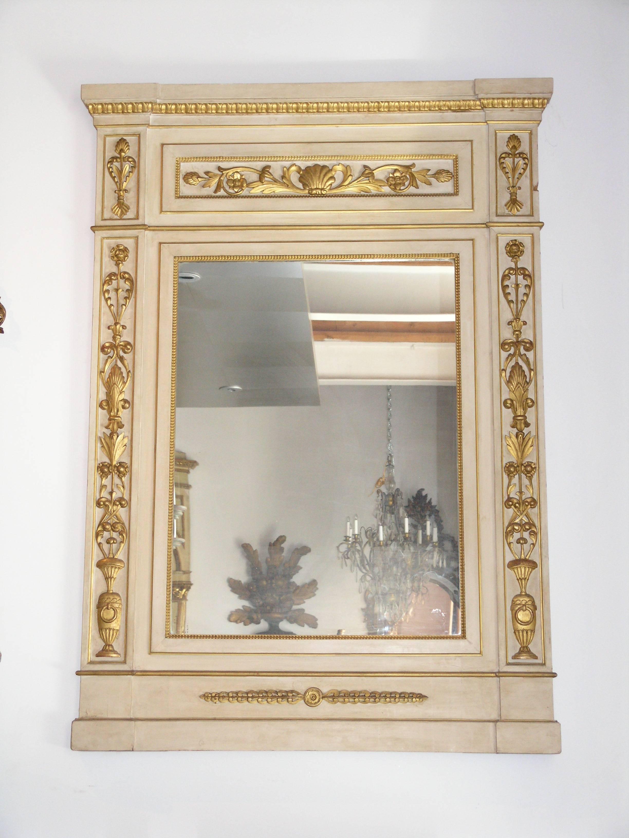 Italian  Pair of Parcel-Gilt and Ivory Paint Trumeau Mirrors For Sale