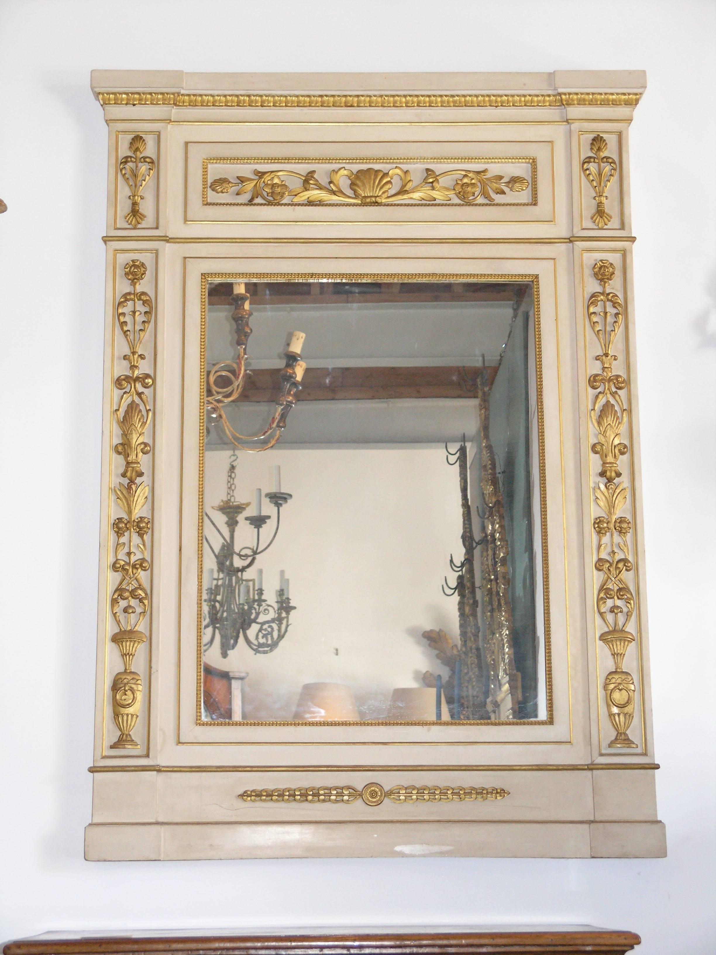 Painted  Pair of Parcel-Gilt and Ivory Paint Trumeau Mirrors For Sale