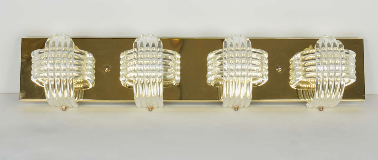 Polished Hollywood Regency Sculptural Lucite and Brass Wall Light by Lightolier