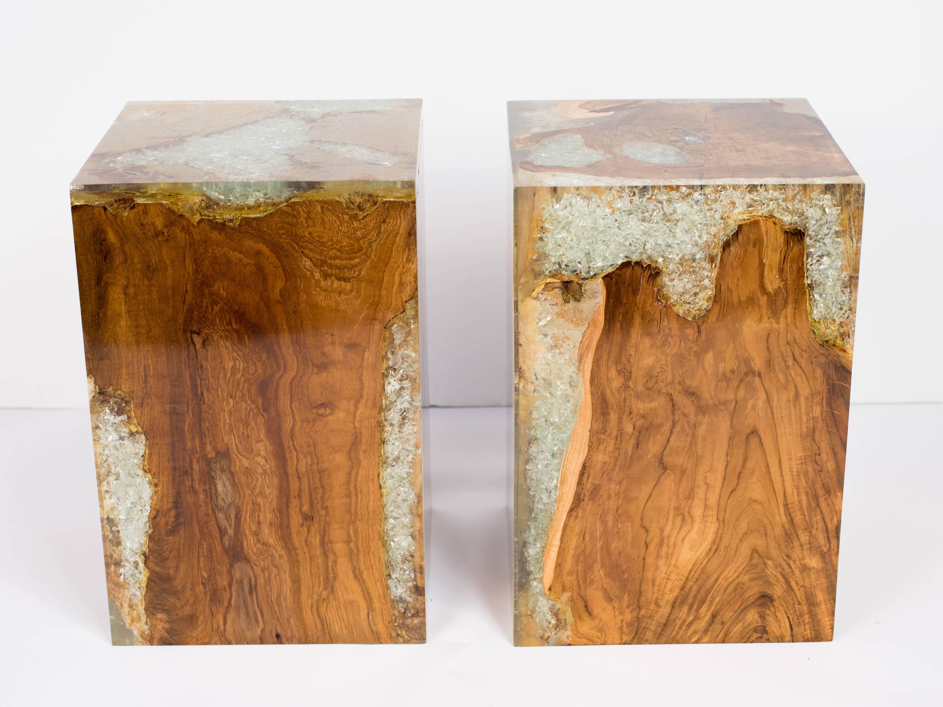 Pair of Organic Modern side tables in natural and bleached reclaimed teak root wood infused with cracked resin. Polished finish with unique wood variations on all sides. Handcrafted in Indonesia for multi-purpose use. Some variation in colors may be