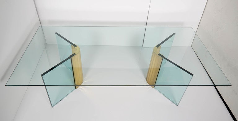 This spectacular coffee table features two identical base compenents in right angle 