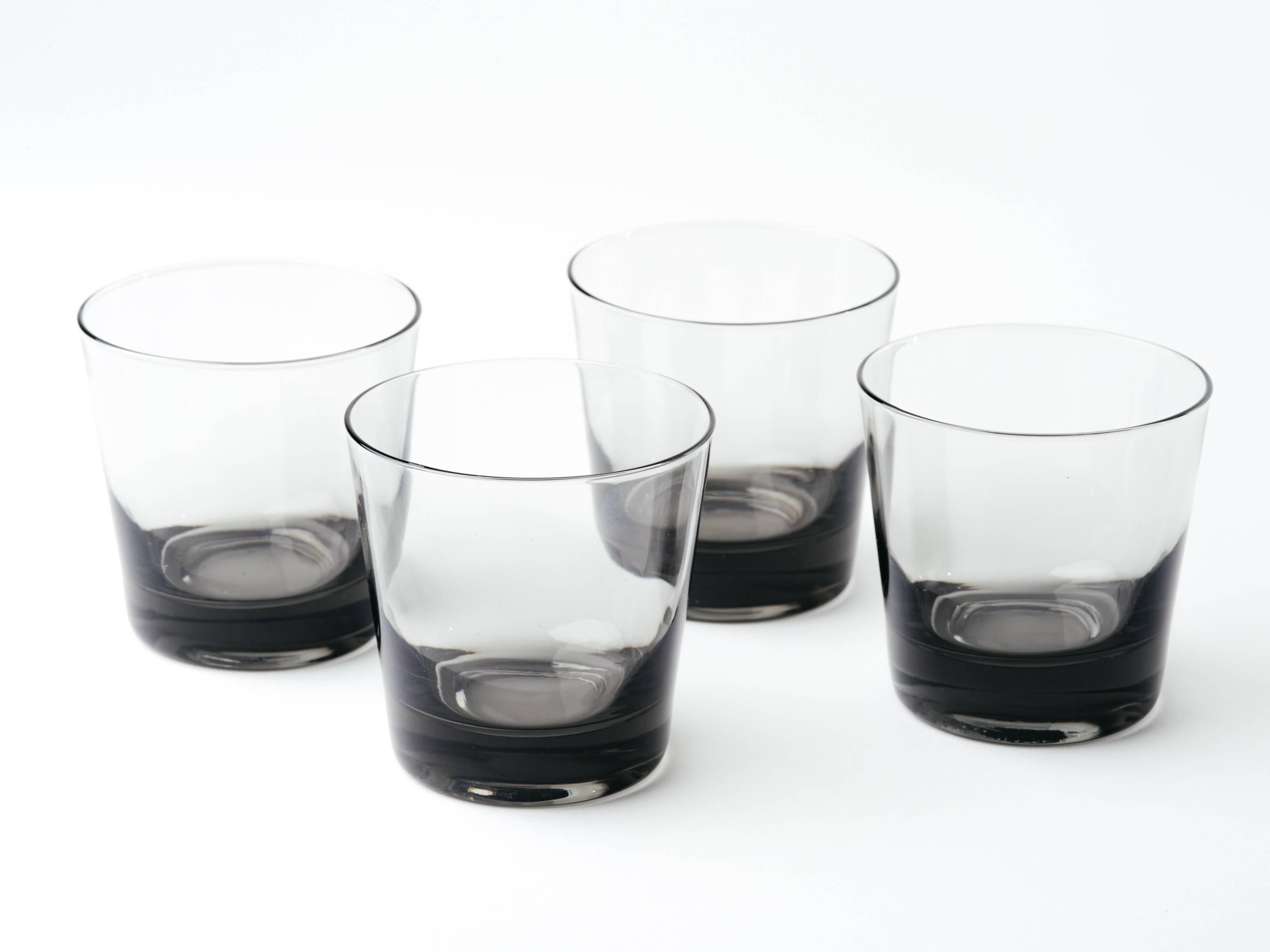 Set of four Scandinavian Modern double old fashion cocktail glasses. Handblown in hues of smoked grey or translucent black.