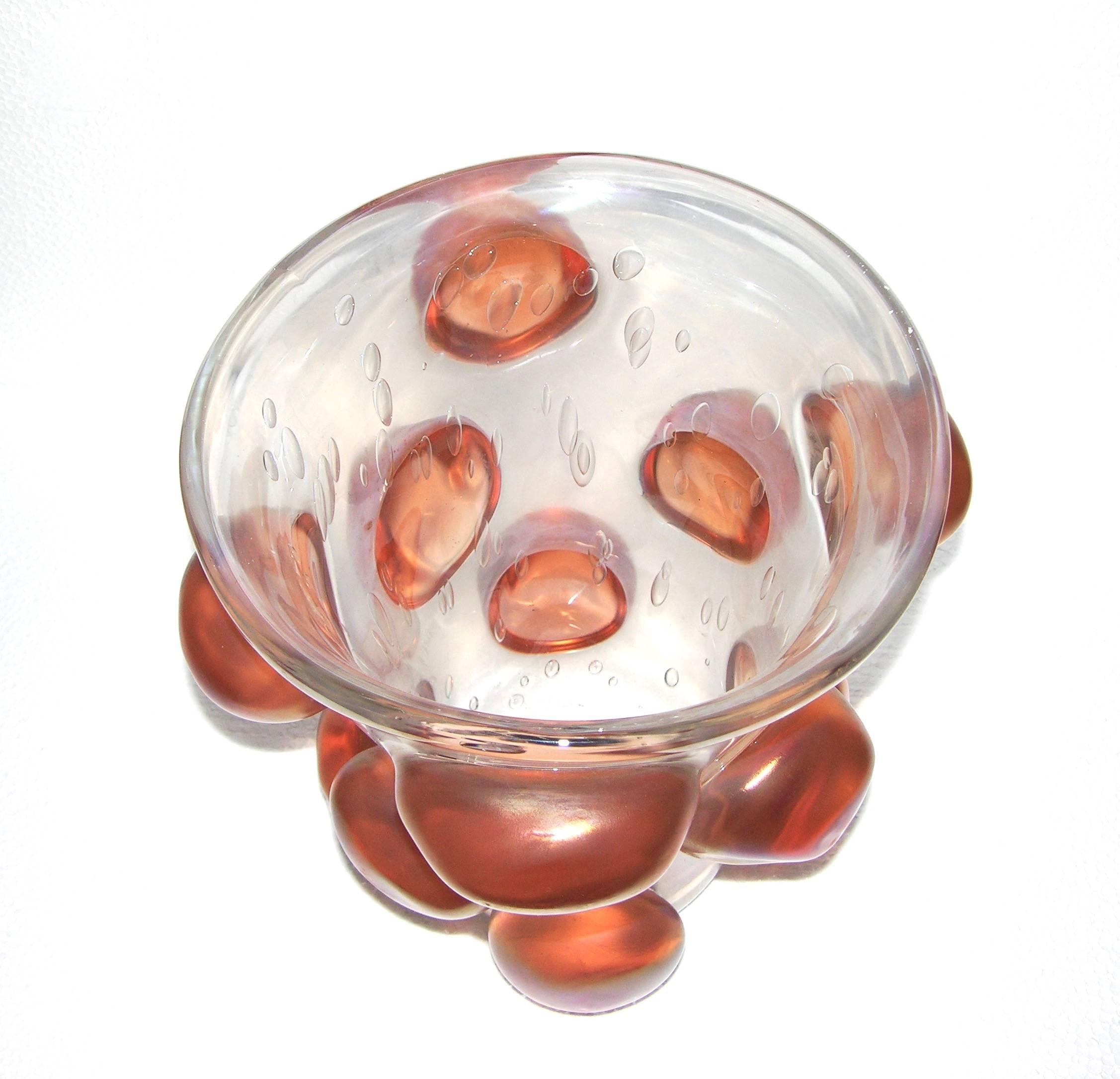 1970s Italian blown Murano glass with high quality of execution. The clear glass is worked with bullicante (big bubbles in the glass) that creates a pattern enriching the texture. The decoration adds to the statement of the large size with