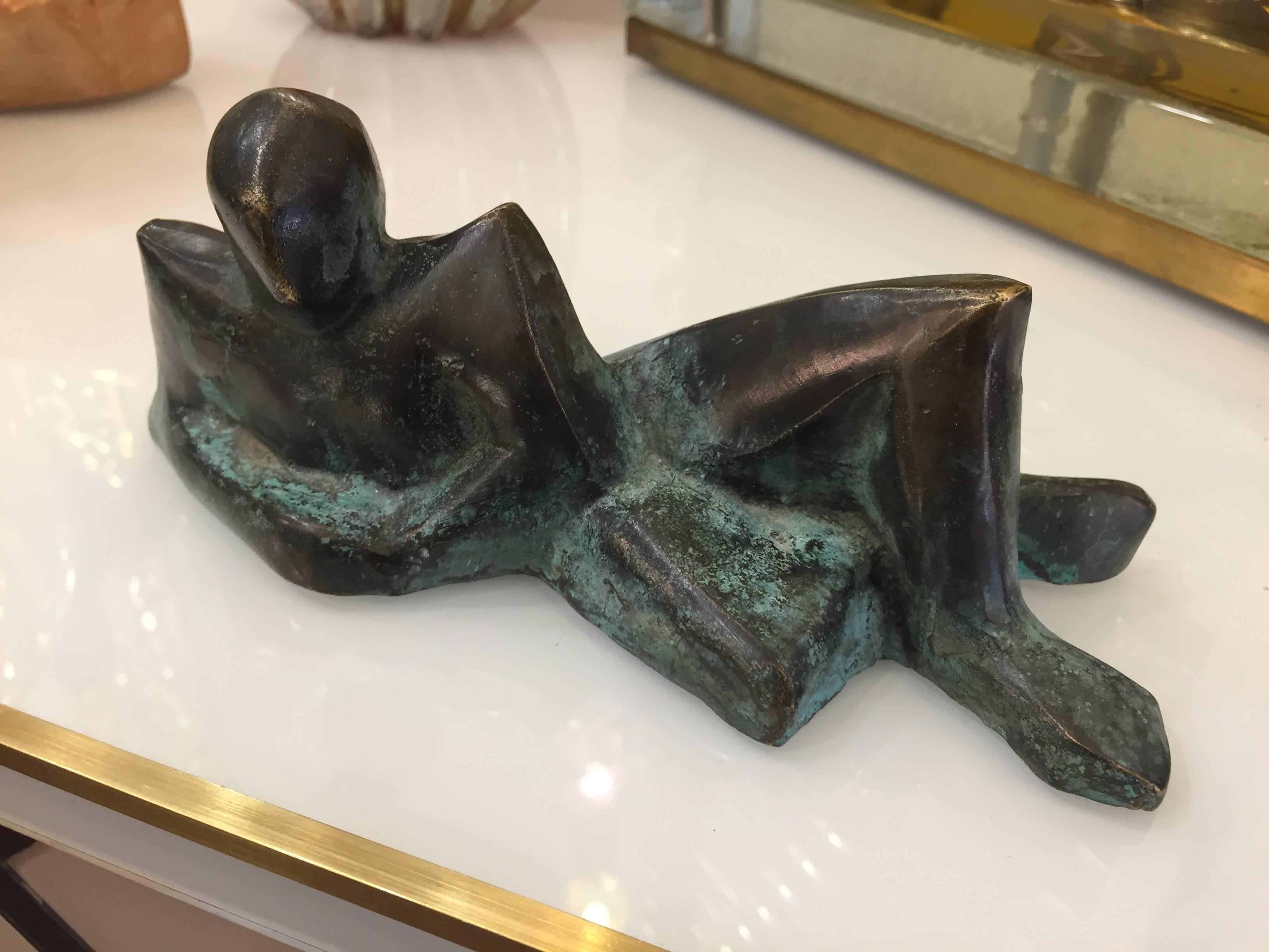 A charming contemporary little bronze, very limited edition, in a very expressive reclining posture, yet minimalist, very attractive on all sides softened with antique finish, signed by the Italian artist Giovanni Ginestroni.
Every piece by