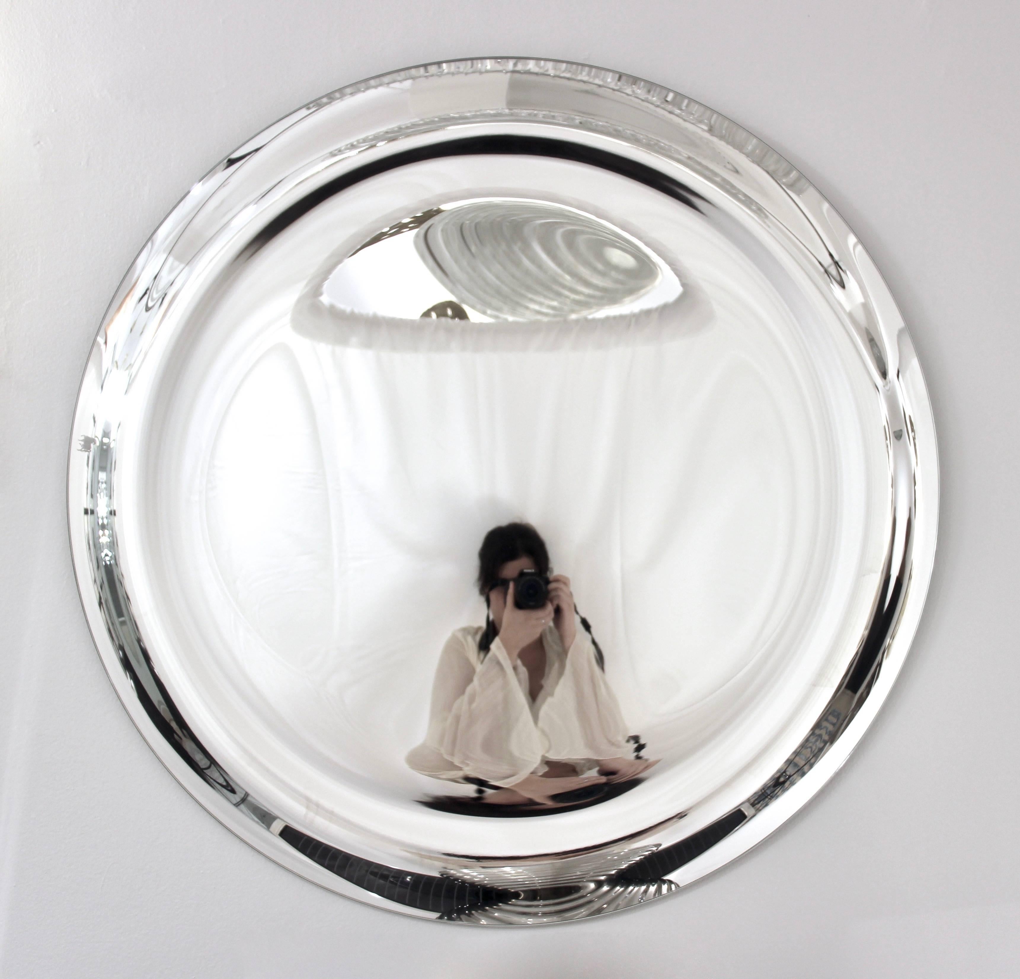 round silver mirror