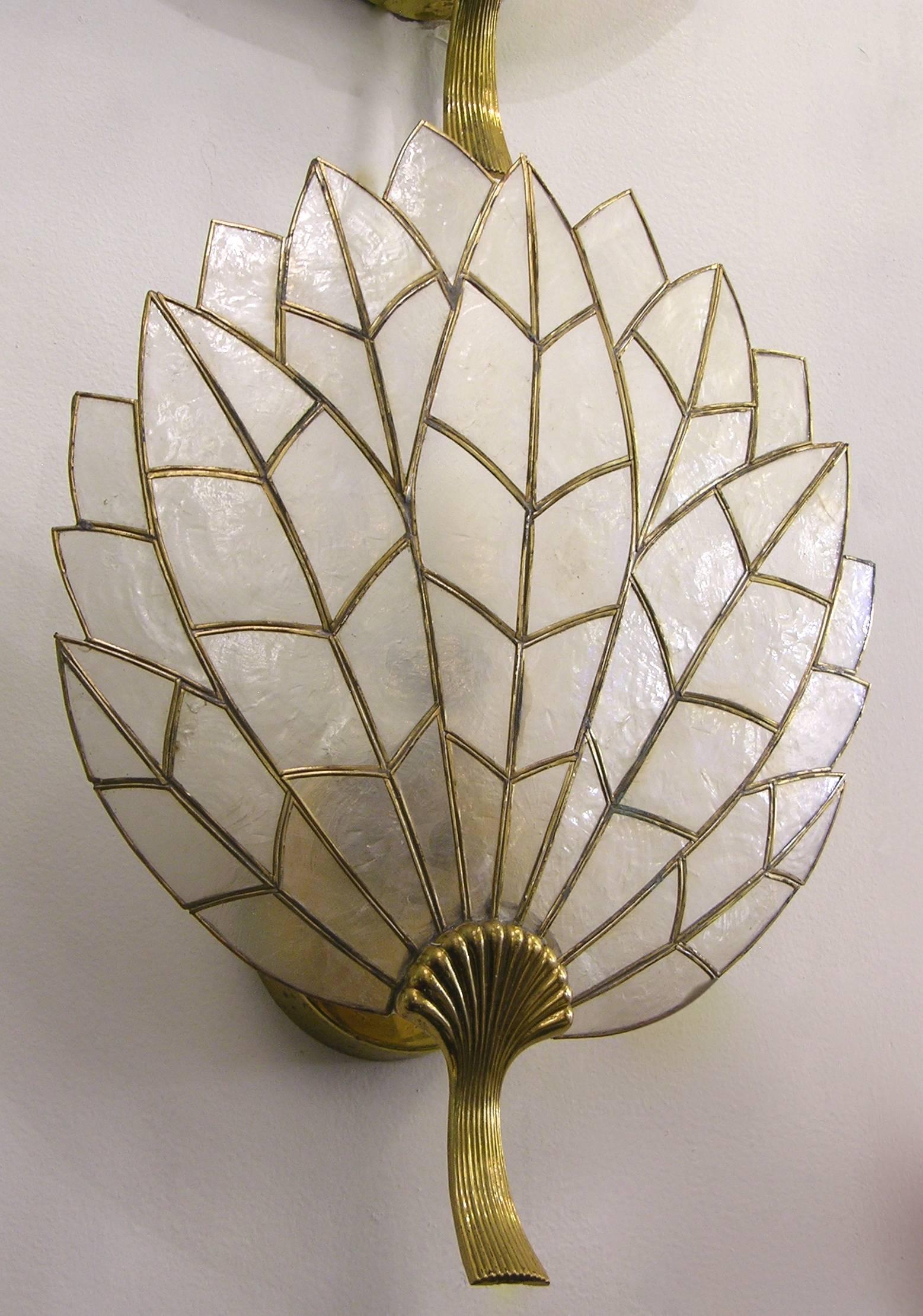 1930s, exquisite French handcrafted mother-of-pearl leaded wall lights, leaves in a fan shape, each one composed of small mother-of-pearl panes hand fixed together with thin lead strips, supported by nicely handcrafted chased brass stems on a round