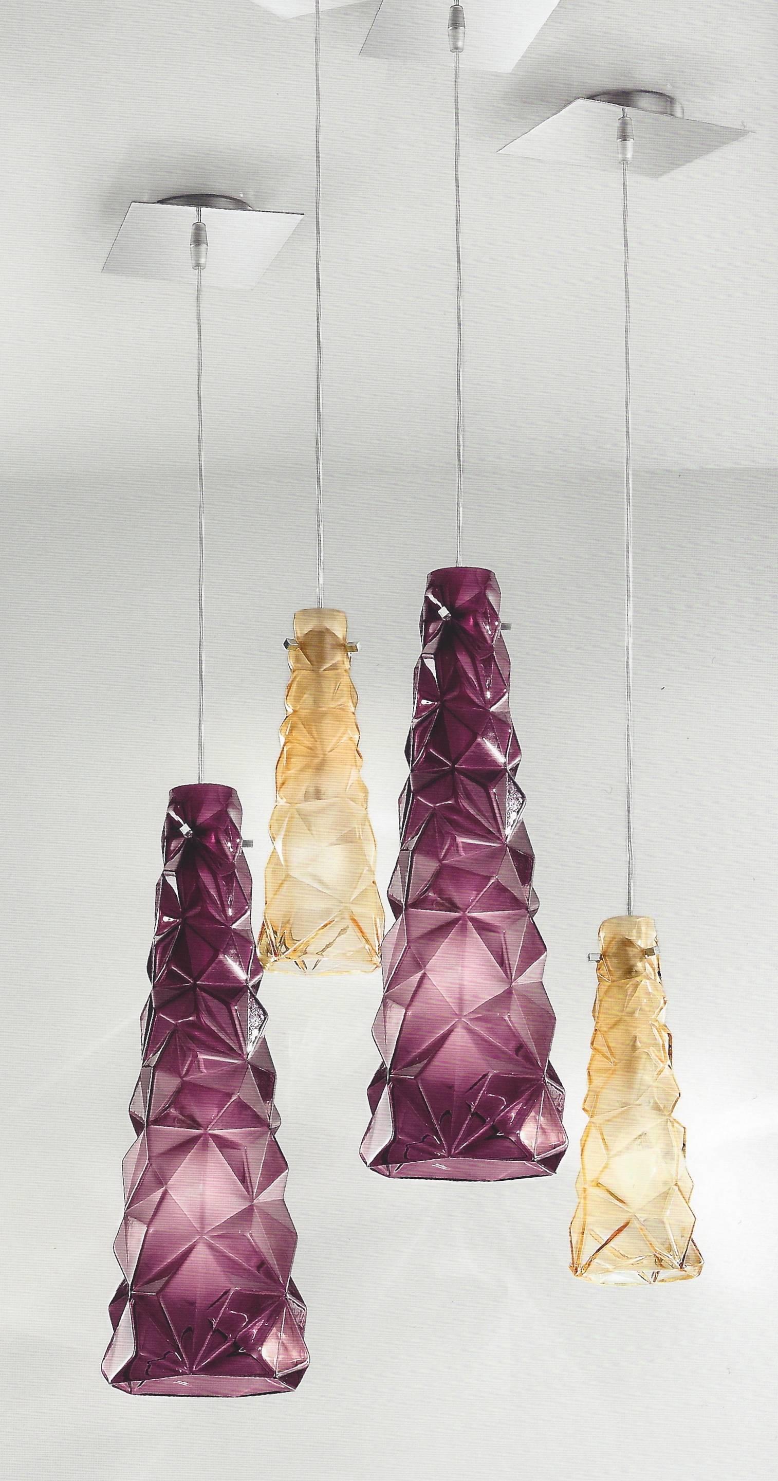 Attractive organic modern pendant lights of trumpet conical shape, hand made in Italy, ideal for a kitchen island, in purple and amber yellow mouth blown Murano glass frosted in the interior to add texture, high quality of the individual handcrafted