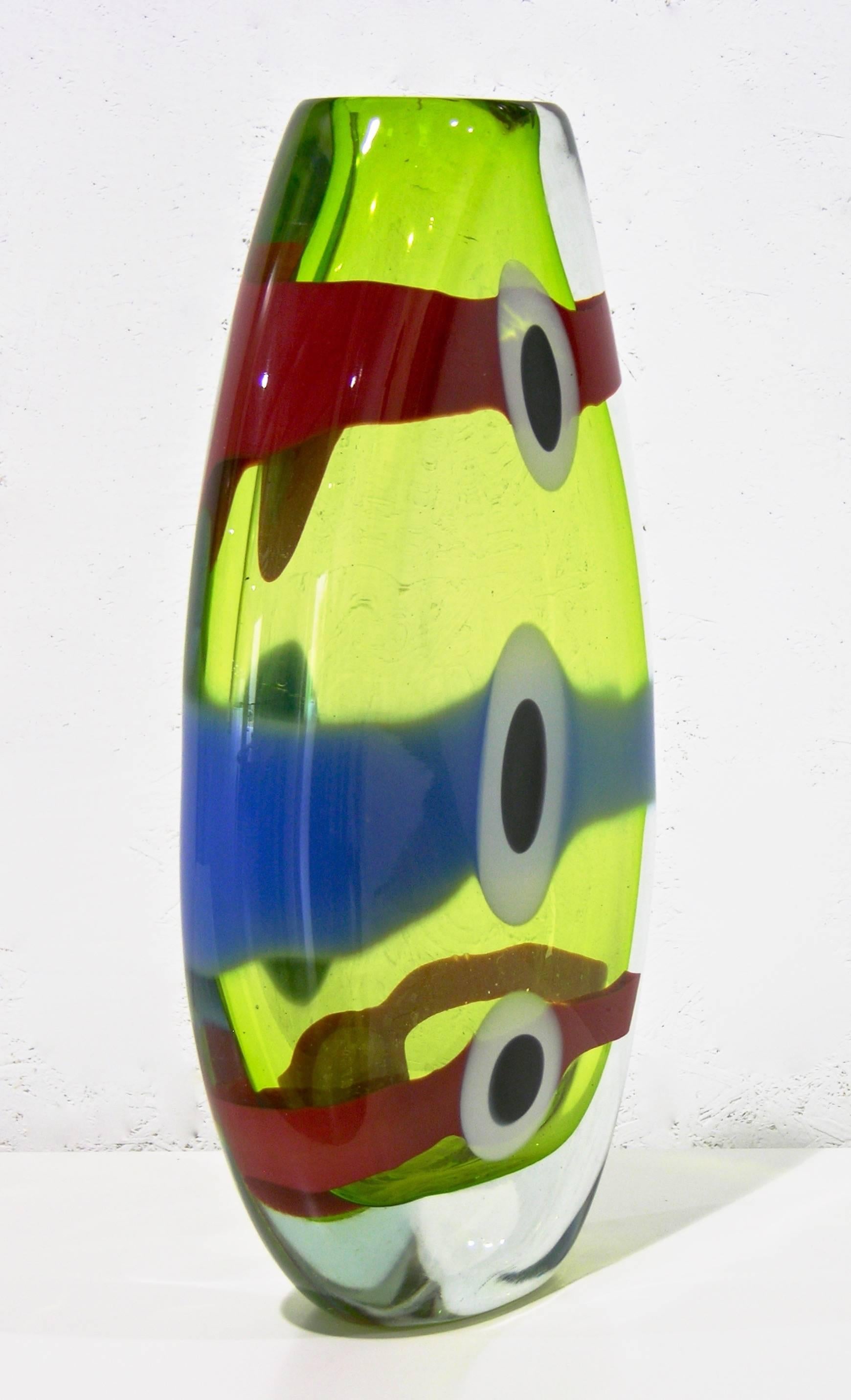 A 1990s colorful blown glass vase worked ad incalmo by the French Artist Olivier Mallemouche, the lime green body worked with colored murrine overlaid in clear glass. Signed.