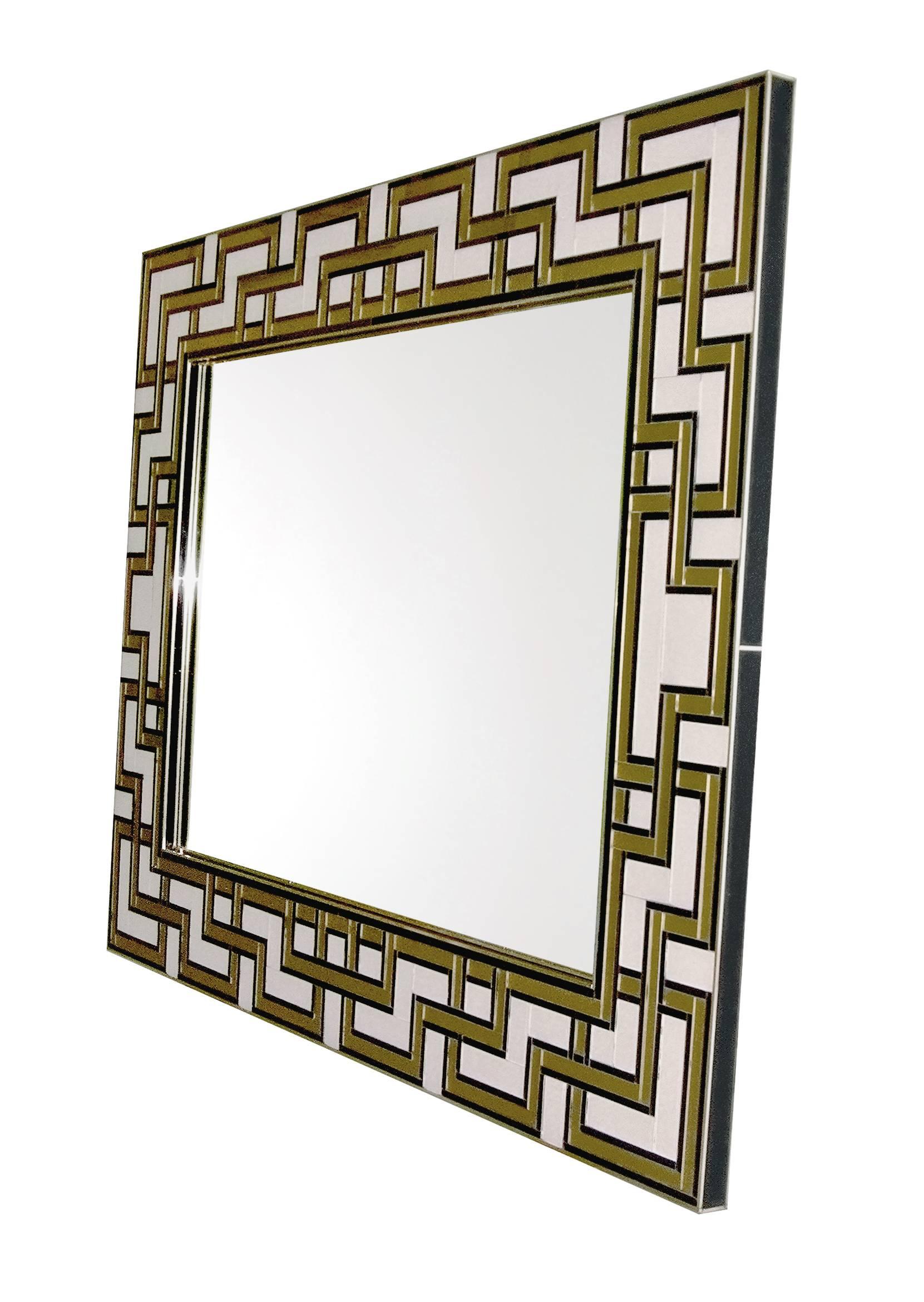 This is a unique mirror, custom-made in Italy, circa 1970s, coming from a Venetian villa outside Venice along the Brenta river.
The large border, entirely handmade, has insets of black, gold and ivory white Murano glass, the black glass sides are