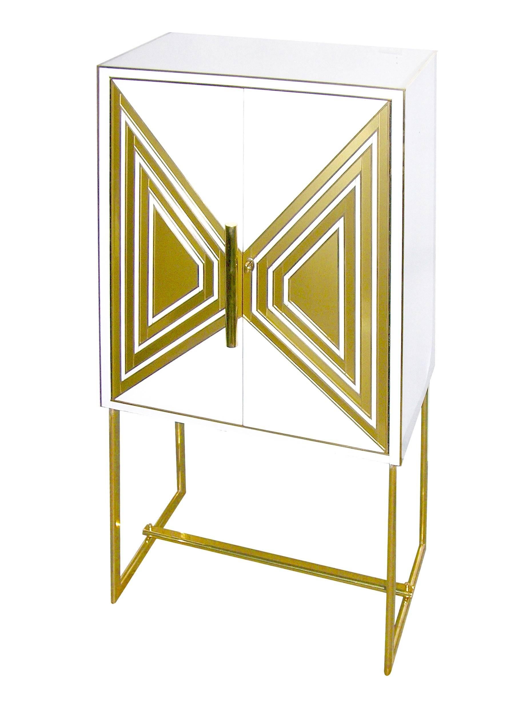 Entirely handmade pair of one-of-a-kind Italian cabinets or buffets of unique and very well thought design with trapezoid sides (depth at the top is 16.25 in.) to match the front pattern, raised on sophisticated sleek oval rounded legs hand made in