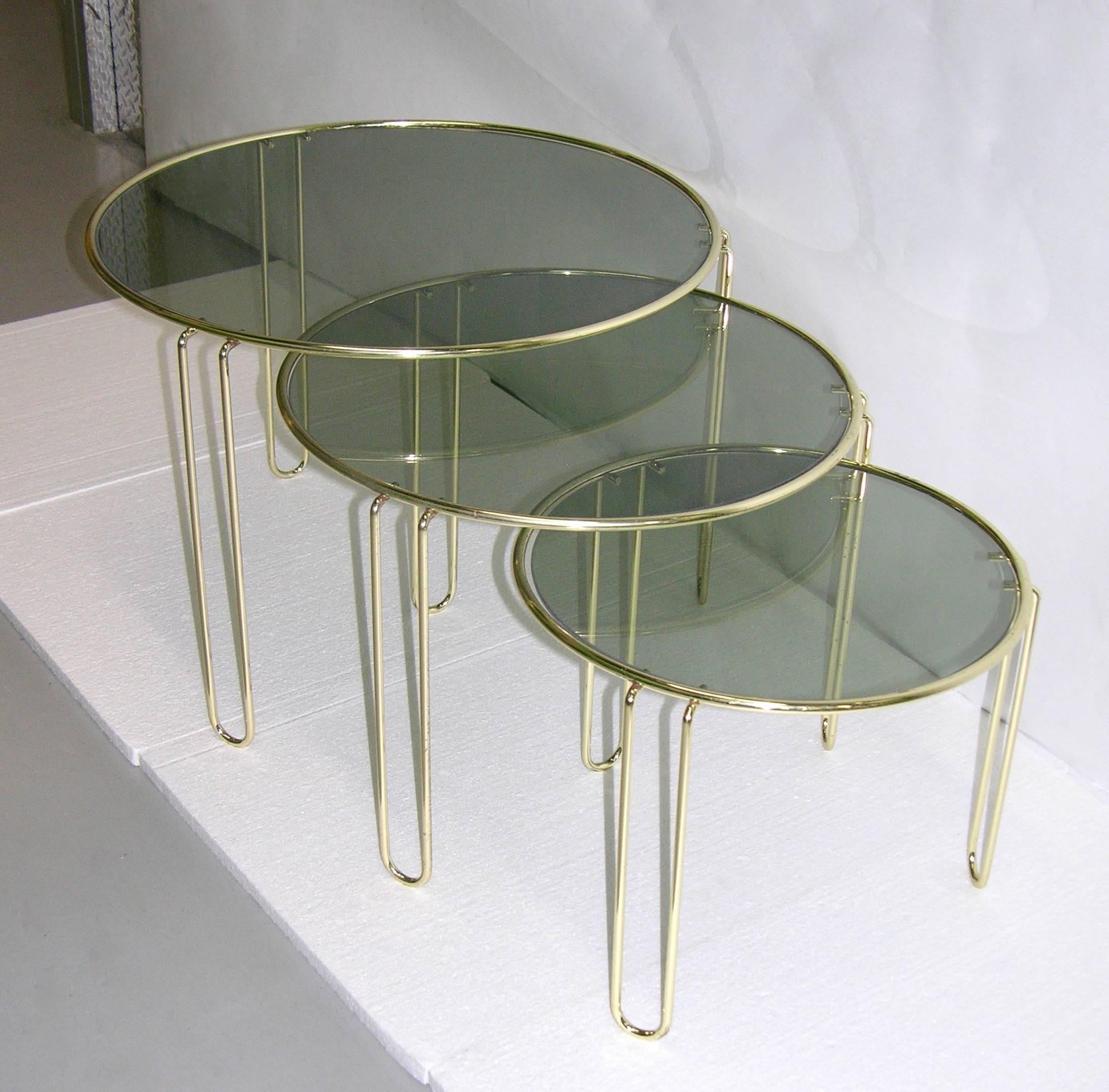 Hand-Crafted 1970s Italian Minimalist Set of Three Brass Smoked Glass Round Nesting Tables